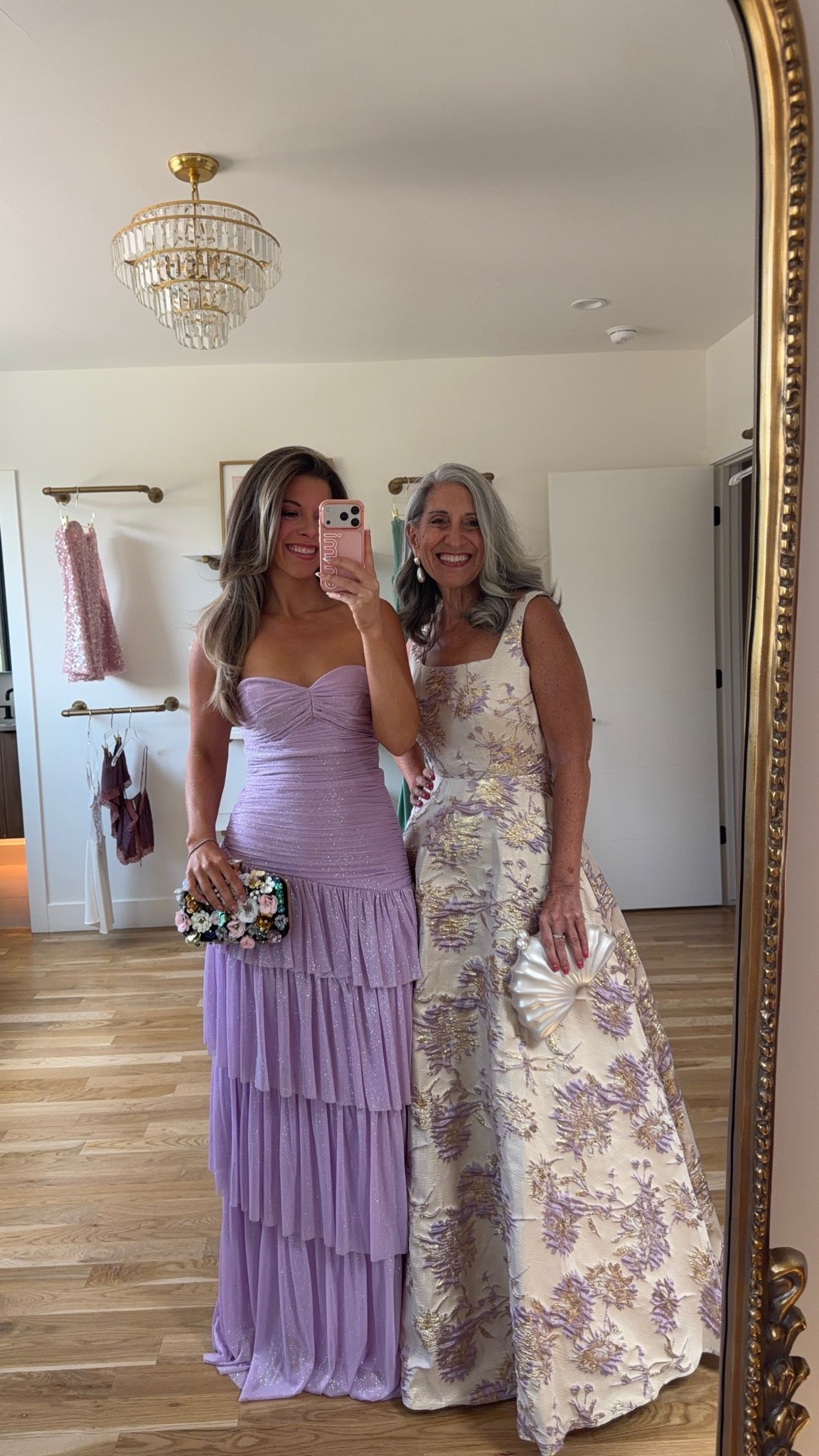 mom and me black tie wedding guest strapless lavender tiered ruffle dress cream 
gold-and-lavender floral embroidered dress 💍💐

mac duggal: emerson10
vici: emeron30

I normally wear a small/2
• Sized up to a 3 in the strapless purple 
 
mom wears a medium/6
• sized down to a 4 in lavender/gold floral gown 

mom & me dresses, wedding guest dresses, mother of the bride, mother of the groom, wedding guest outfit ideas, black tie, cocktail attire

#LTKgrwm #LTKootd #LTKWedding