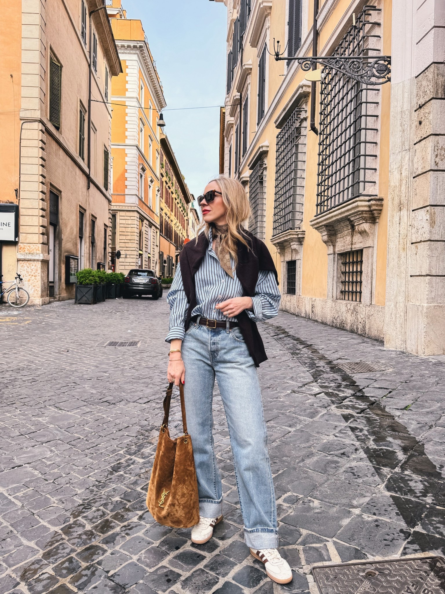 Travel outfit, spring outfit, @Zara striped button down shirt, @levi baggy 90’s jeans, Adidas Samba sneakers, YSL suede bucket bag

#LTKOver40 #LTKSaleAlert #LTKTravel