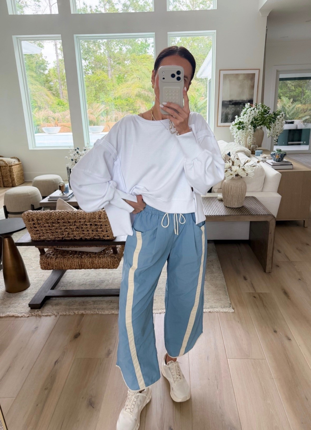 This outfit is the perfect mix of comfy and put together. The striped pants give it that sporty vibe while the oversized sweatshirt keeps it cozy for everyday wear.

athleisure outfit, casual comfy style, spring outfit ideas, sporty chic outfit, everyday outfit, lounge to street style, blue pants outfit, relaxed fit outfit, travel day outfit, amazon fashion finds, annabrstyle

#LTKootd #LTKfitnessgoals #LTKActive