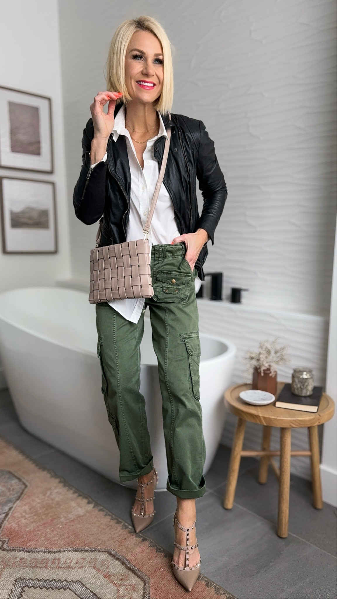 These cargo pants have been so fun to style! I’m all about a versatile piece that can be worn multiple ways. Even a little cuff at the hem makes them look different 👌🏽. Love the juxtaposition of styles in this look: utility, structured/sophisticated and edgy! 
You will love this convertible handbag —> it can be carried as a clutch or worn as a crossbody. 7 more colors!
Sizing ~
Top: size down, wearing a small
Cargo pants: size down, wearing a small 
Shoes: go up 1/2 sizees
Lip: true coral

👉🏼for necklaces email me: hello@bethanybrost.com
