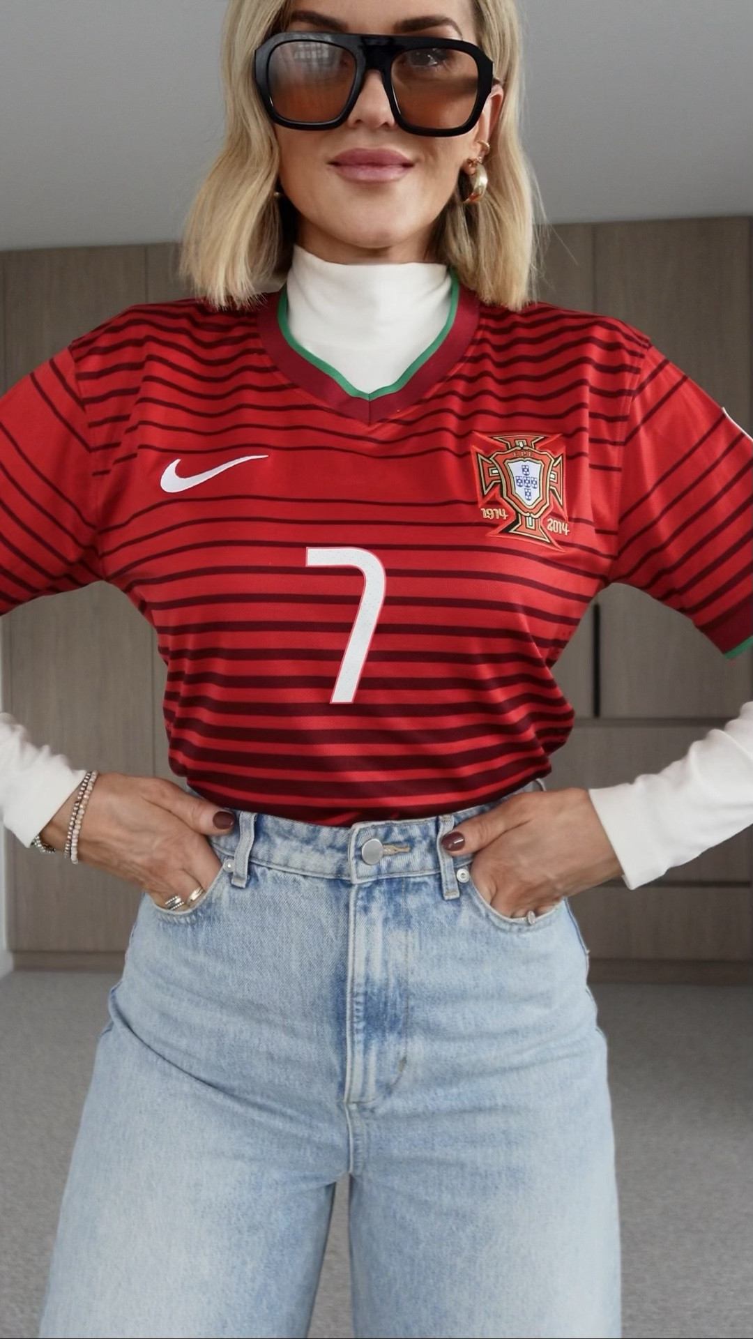 The ⚽️ World Cup is here, so I am turning a classic football jersey into the ultimate sporty-chic moment.

Are you styling your jersey with denim or tailored pieces? 

Also, Go Ozzies!! 🇦🇺🔥 (what a win!!) 

Wearing:
Jersey: vintage Ronaldo 2014 World Cup
White top: @targetaus 
Jeans: @countryroad (the ones tagged are in the darker wash) 
Sneakers: @adidasau 
Bag: @kmartaus 
Sunnies: @rhodin_collection 

#footballoutfit #melbournemums #outfitinspirations #soccermum #sportychic
