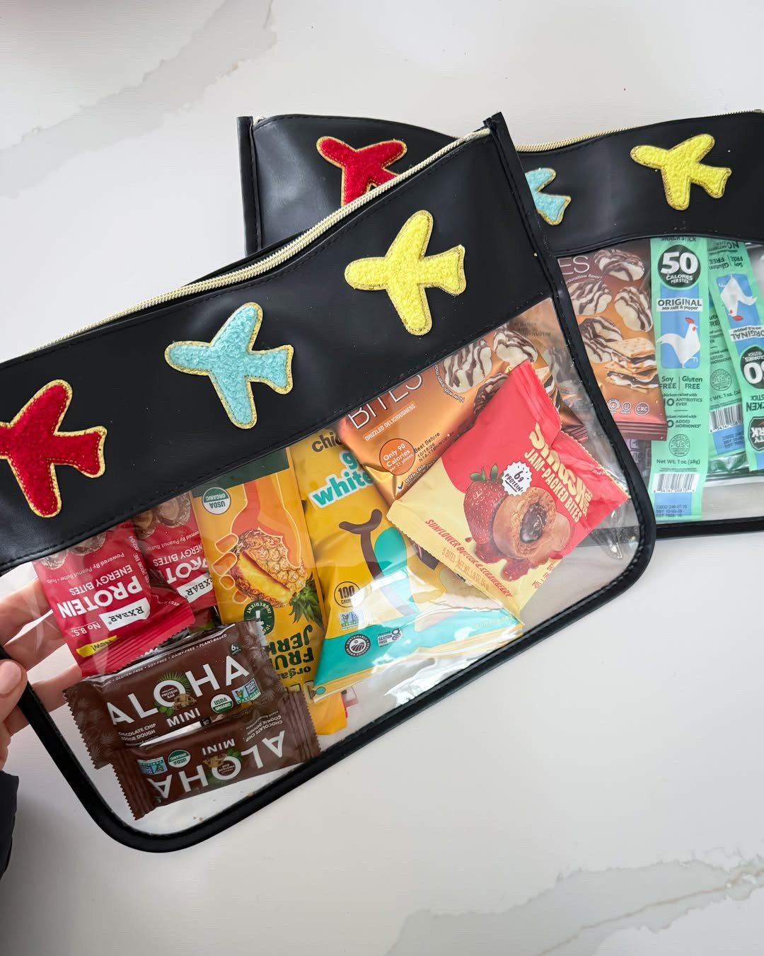 If you're traveling with kiddos, these snack bags are a must! 

travel bags essentials
carry on luggage bags
weekender travel bags
travel tote bags
lightweight luggage options
packing bags and organizers
duffle bags for travel
travel backpacks for women
rolling luggage and suitcases

#LTKSeasonal #LTKSaleAlert #LTKTravel