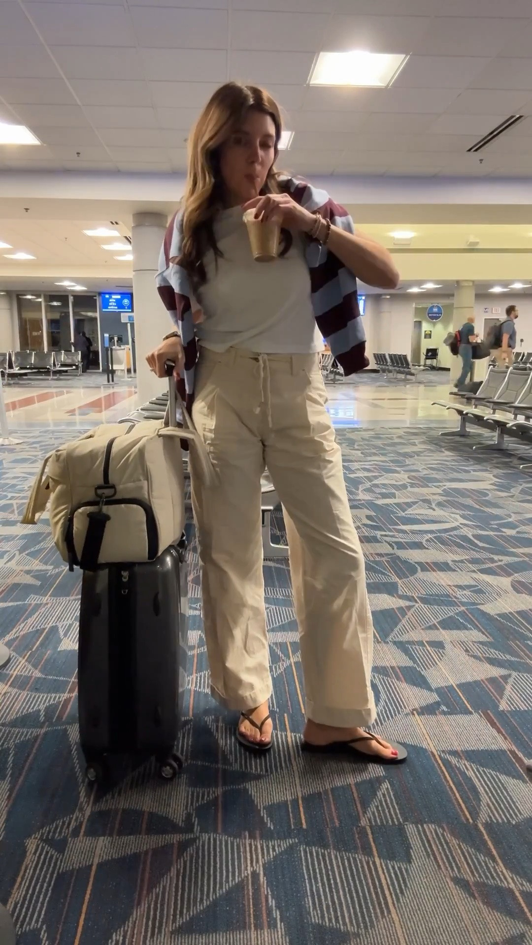 One of my favorite travel outfits: cargo pants in a size small, rugby striped pullover in an xs.

#LTKSaleAlert #LTKOver40 #LTKTall