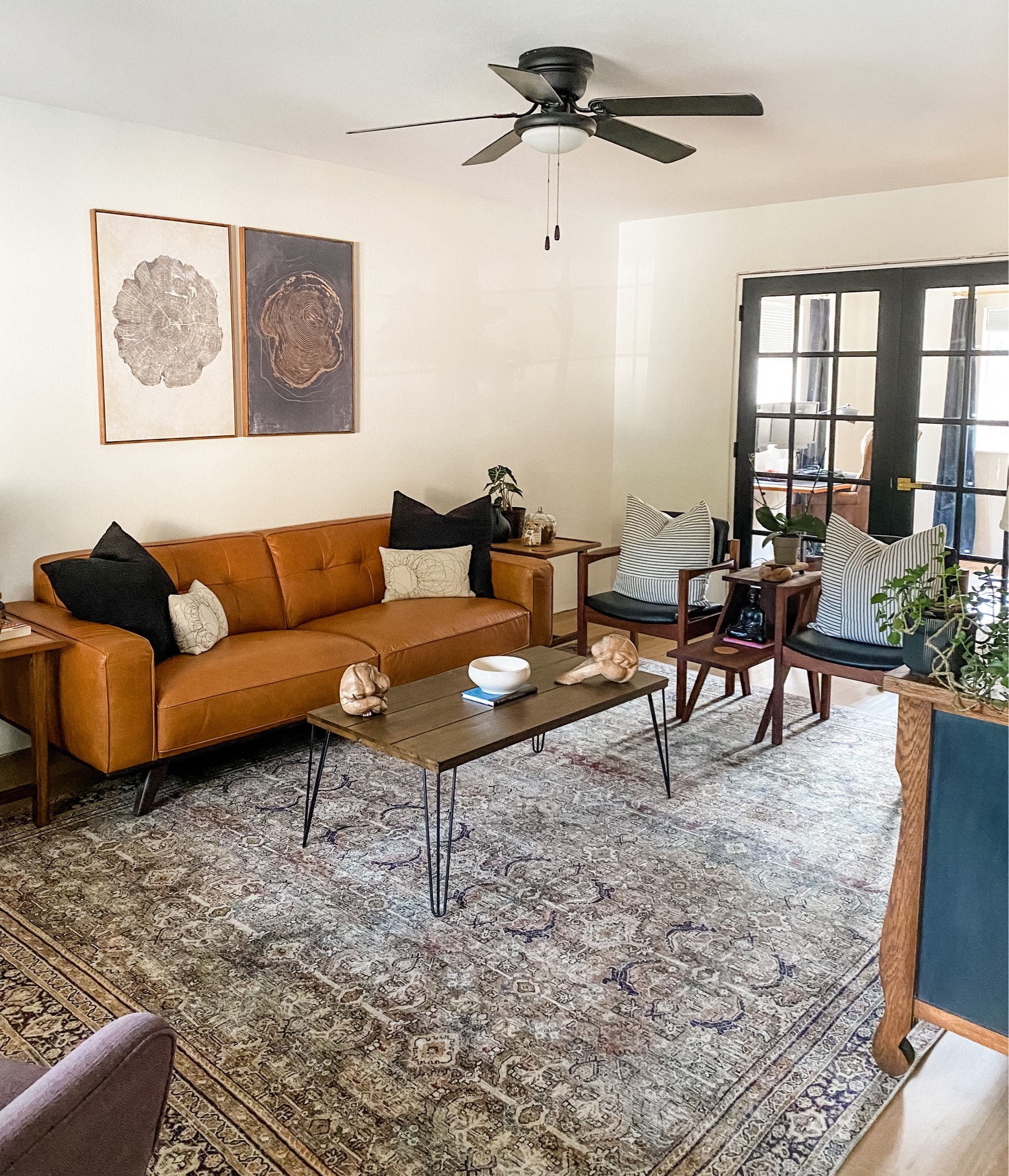 When I was thinking design style for this room I wanted #darkandmoody with a touch of #midcenturymodern. Did I deliver? 

#LTKhome