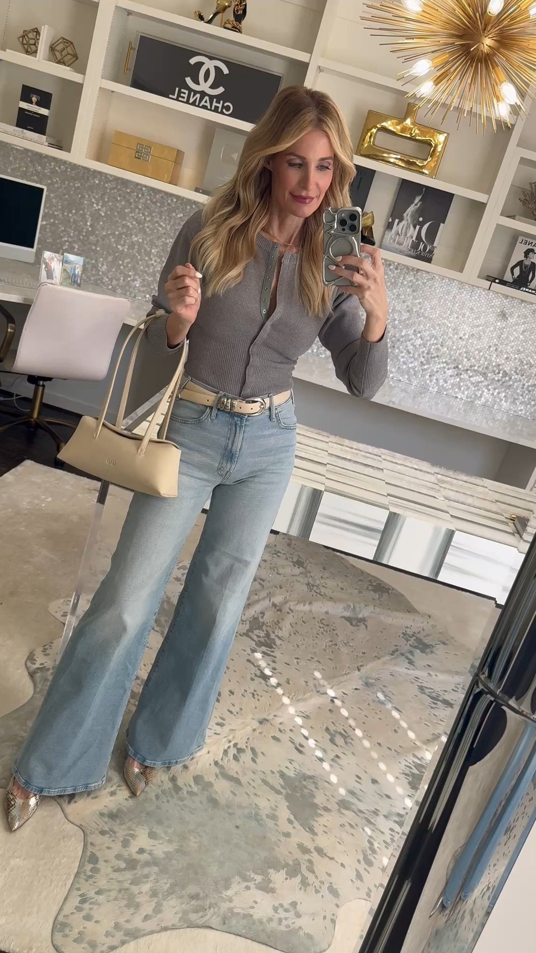 Soft layers + flattering denim = the kind of outfit you’ll wear on repeat 🤍 This gray ribbed cardigan is so slimming through the waist and the snap-front lets you adjust the neckline depending on how you style it. Paired with these high-waisted wide leg Mother jeans (a top seller for a reason!), the floor-grazing hem and perfectly placed back pockets give that subtle lift we all love. Such a chic spring and summer outfit formula.

I'm wearing an XS in the Cardigan and a size 24 in the Jeans and they both fit tts.

#LTKOver40 #LTKDenim #WideLegJeans #SpringOutfitIdeas #WardrobeStaples 

 #LTKootd #LTKOver40 #LTKPetite