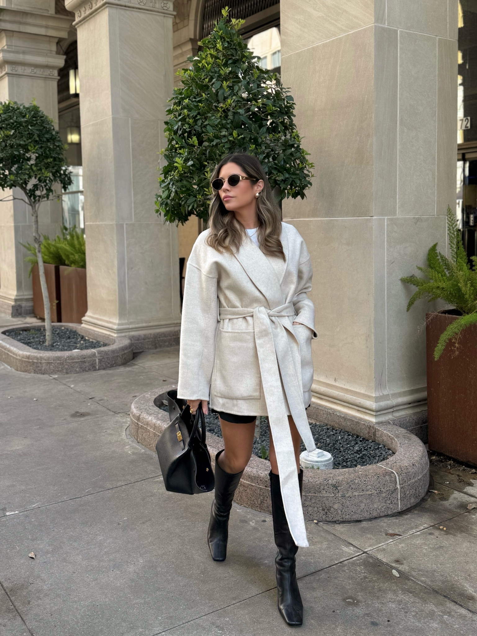 Wrap coat and black boots 

#LTKStyleTip