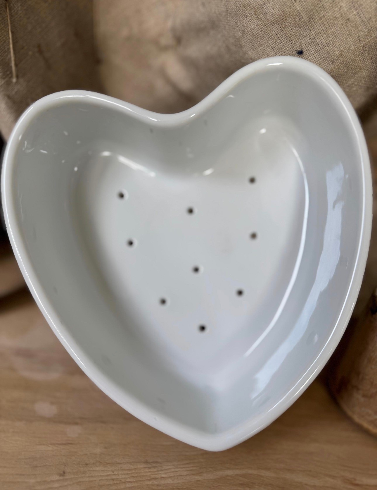 Old-world French charm in the sweetest form.
This heart-shaped porcelain cheese mold doubles as a berry strainer or sculptural kitchen accent.


#LTKHome