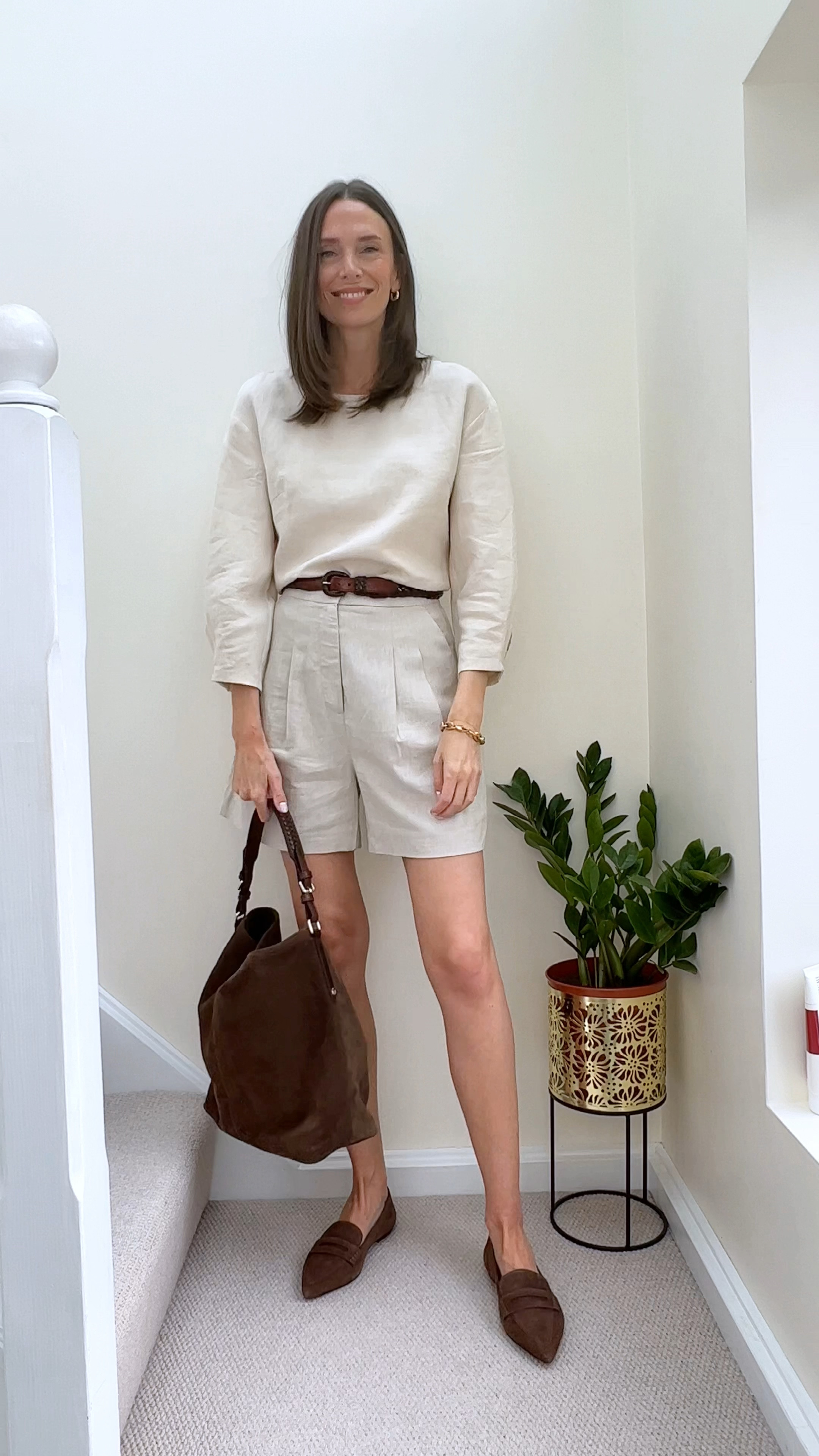 A simple summer outfit that is all about quiet luxury. Good quality linen is such a pleasure to wear and style. And the colour combination of stone and chocolate brown looks so chic for the summer months. I’m wearing a UK 8 in the shorts - they’re quite generous. 

I was obsessed with finding a pair of chocolate brown shoes to match my Fairfax and Favor bag and I finally did! This lovely pair from Boden are just right. 

Linen outfit, casual summer outfit, summer outfit, 

#LTKSeasonal #LTKstyletip #LTKeurope