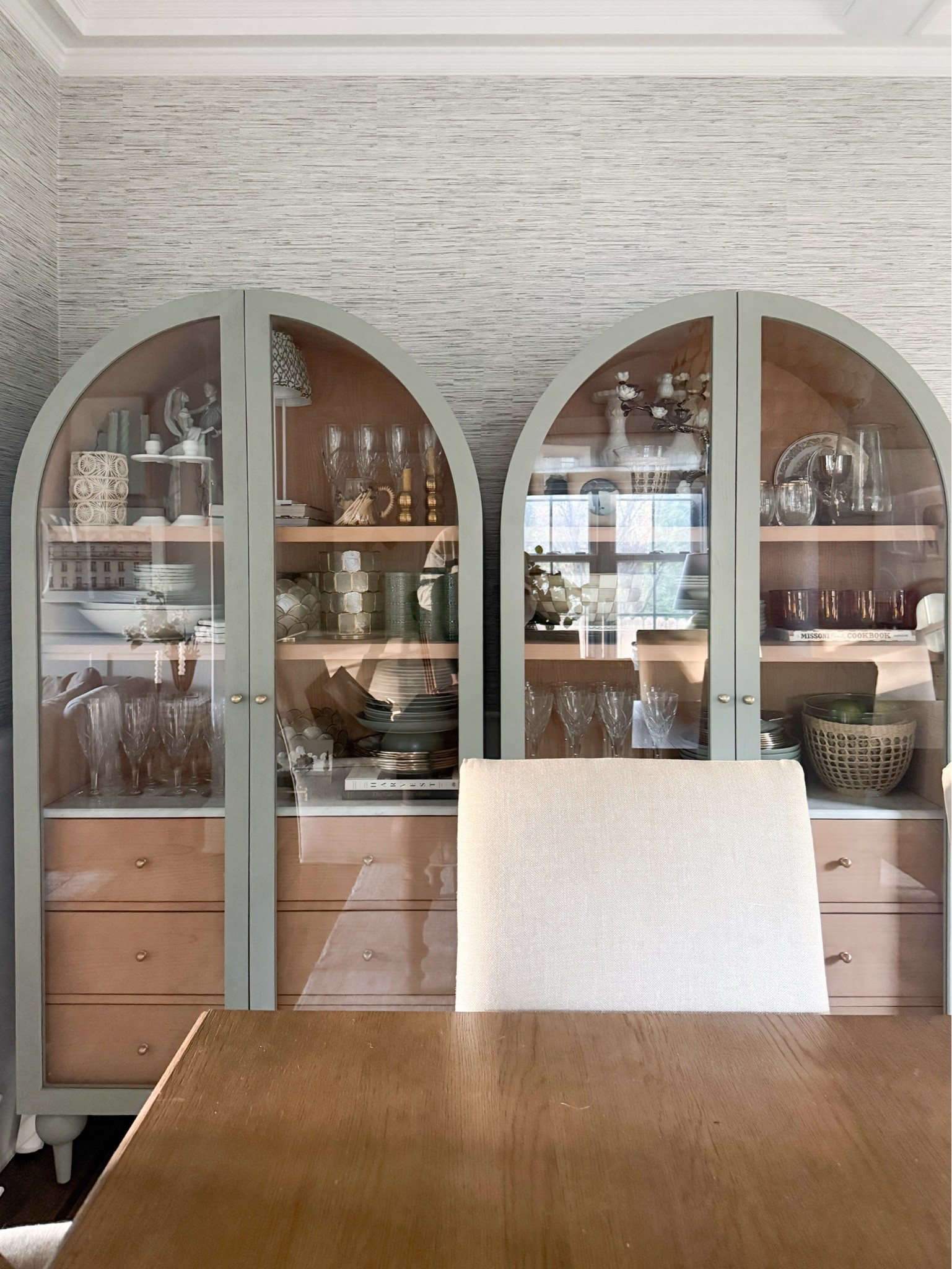 Our arched dining room cabinets are on sale! They come in several colors (I have the Sage here). Drawers for storage and the prettiest marble countertop — they provide so much functional storage while looking beautiful!!

#LTKSaleAlert #LTKHome #LTKSeasonal