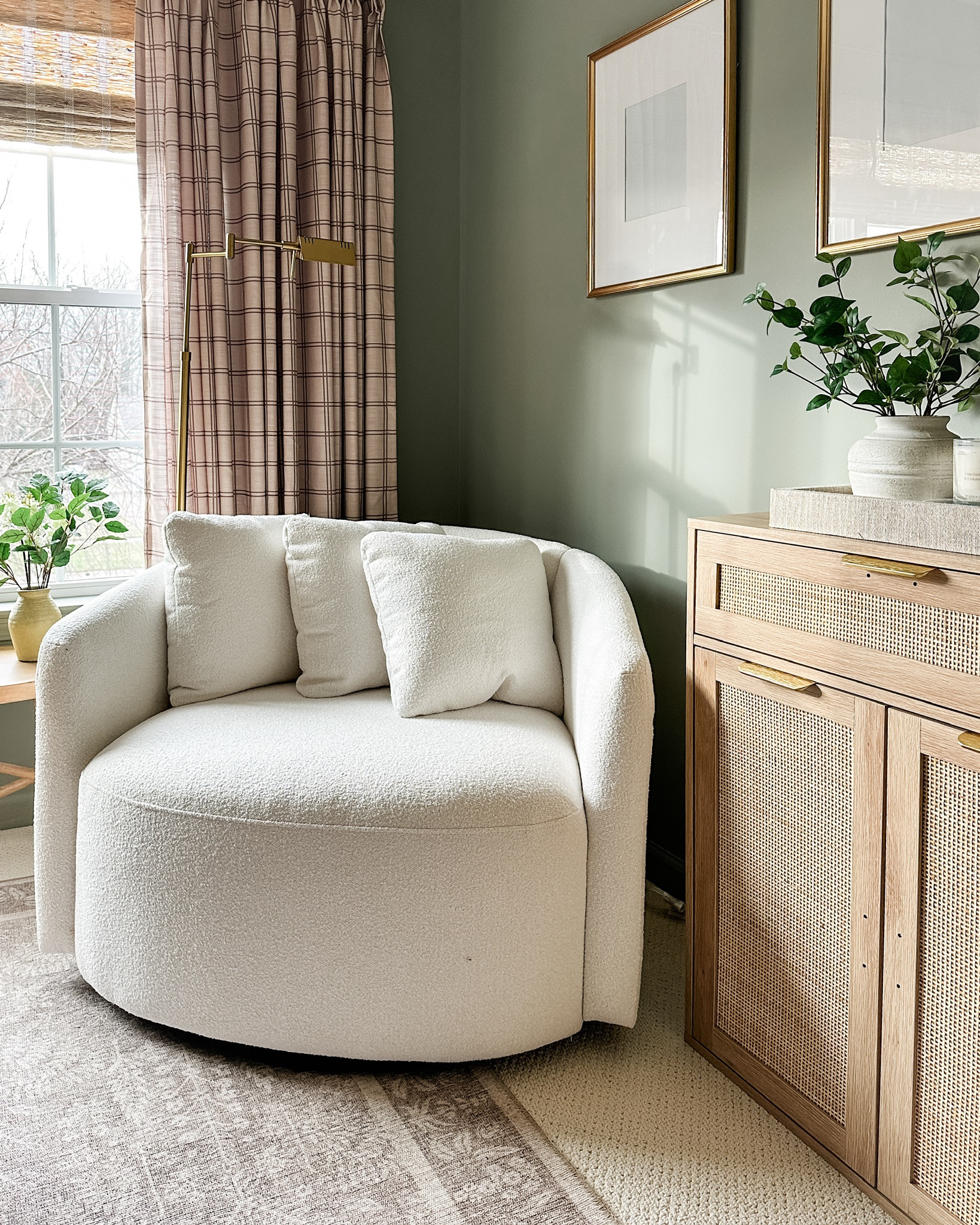 Cozy corner: Walmart swivel chair, viral Amazon cabinets, floor lamp, gold frames, plaid curtains, faux greenery 

#LTKhome #LTKstyletip #LTKSeasonal