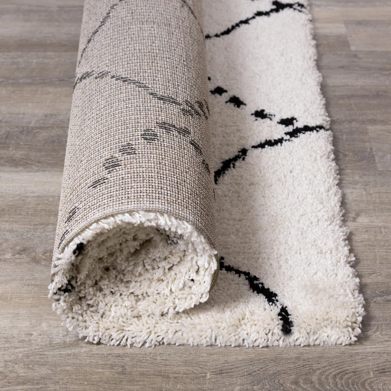 Lydon Soft Geometric Ivory/Black Indoor Area Rug | Wayfair North America