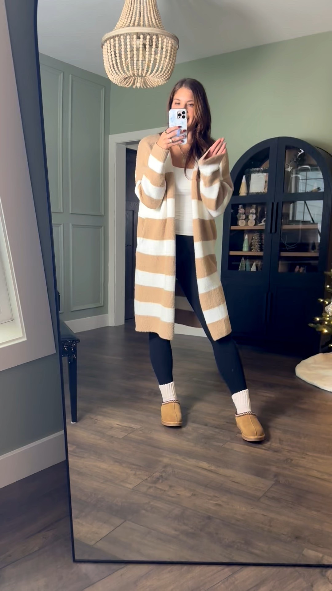 This long striped cardigan is too cute and so comfy! It pairs perfectly with leggings but can be dressed up with jeans and booties. The perfect winter staple! 

Long cardigan, striped cardigan, long length leggings, slippers, tanks, basics, Amazon finds, coin necklace, tall girl approved, Stang and Co


#LTKSeasonal #LTKTall #LTKootd