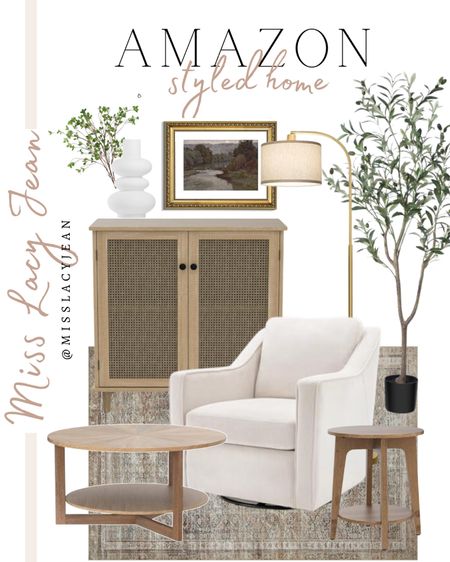Amazon styled home includes faux tree, gold floor lamp, wall art, vase, greenery stems, accent chair, area rug, small cabinet, accent chair, coffee table, side table.

Home decor, styled home, living room, home accents, looks for less

#LTKfindsunder100 #LTKstyletip #LTKhome