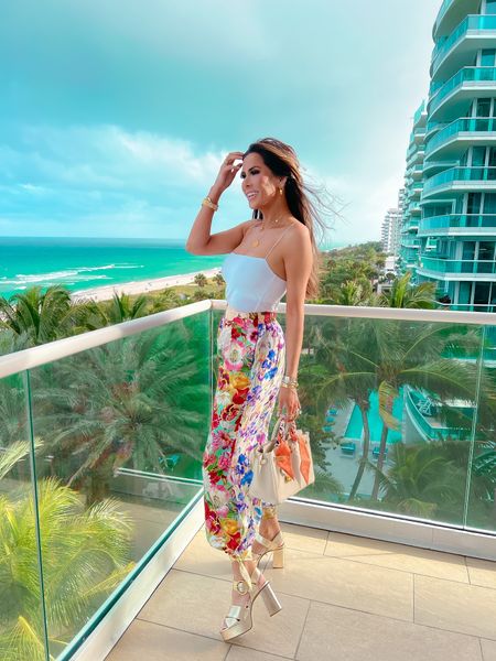 Miami Outfit Ideas, Vacation Outfits, Zimmermann, Floral Pants, Good American Bodysuit, See by Chloe Heels, Gold Heels, Spring outfit, summer outfit, emily Ann Gemma 

#LTKshoecrush #LTKSeasonal