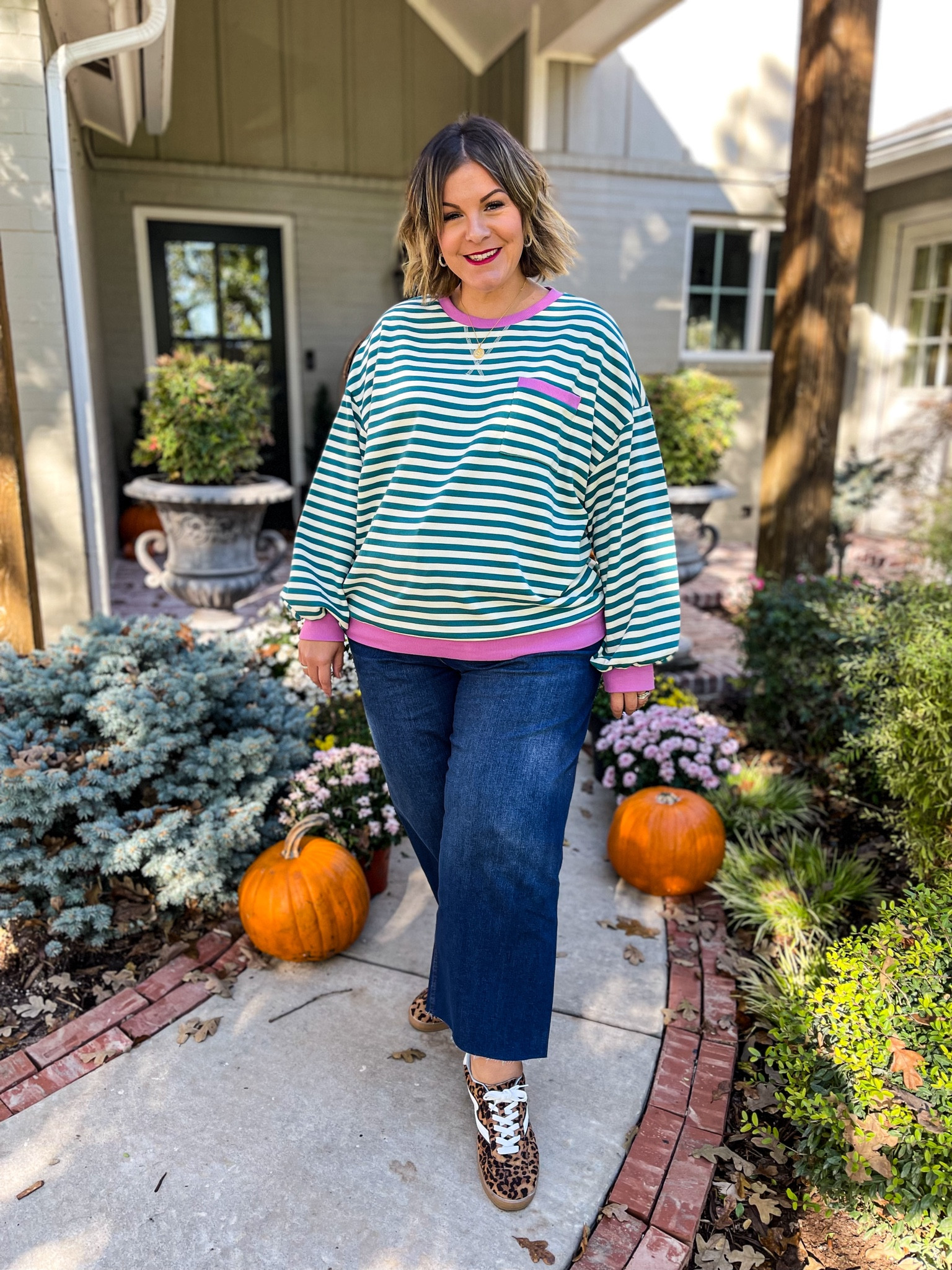 This lightweight Amazon sweatshirt is the cutest! I also love these cropped Sofia Vergara jeans from Walmart! Wearing the sweatshirt in XXL for an oversized fit and the jeans in my true size 18. Linking similar leopard sneakers. This would be a cute teacher outfit! 

#LTKFindsUnder50 #LTKPlusSize #LTKMidsize