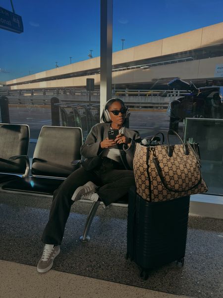 Abercrombie grey jeans, grey jacket. Away carryon suitcase, Gucci travel tote (linked similar) and headphones perfect for travel vacation, adidas sneakers 

#LTKshoecrush #LTKstyletip #LTKtravel