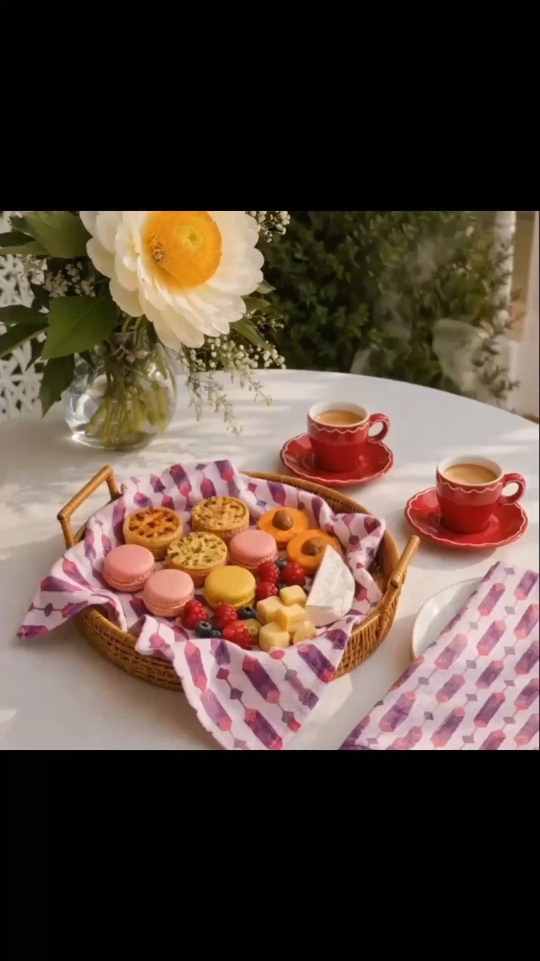 Morning coffee always feels more special with a beautiful table setting. ❤️☕ These red scalloped espresso cups bring such a cheerful and romantic touch, styled with colorful geometric napkins, a crisp white tablecloth, a woven rattan tray filled with pastries, macarons, berries and cheese, plus a soft flower arrangement to complete the moment. Bright, playful and full of charm—the perfect way to start the morning outdoors.

#MorningCoffee #MorningCoffeeMoment #EspressoCup #RedEspressoCup #RattanTray #GeometricNapkin #WhiteTablecloth #FlowerArrangement #OutdoorLiving #OutdoorTableSetting #CoffeeLovers #RomanticStyle #AlFrescoLiving #LTKHome

#LTKdayinmylife #LTKHome #LTKSaleAlert