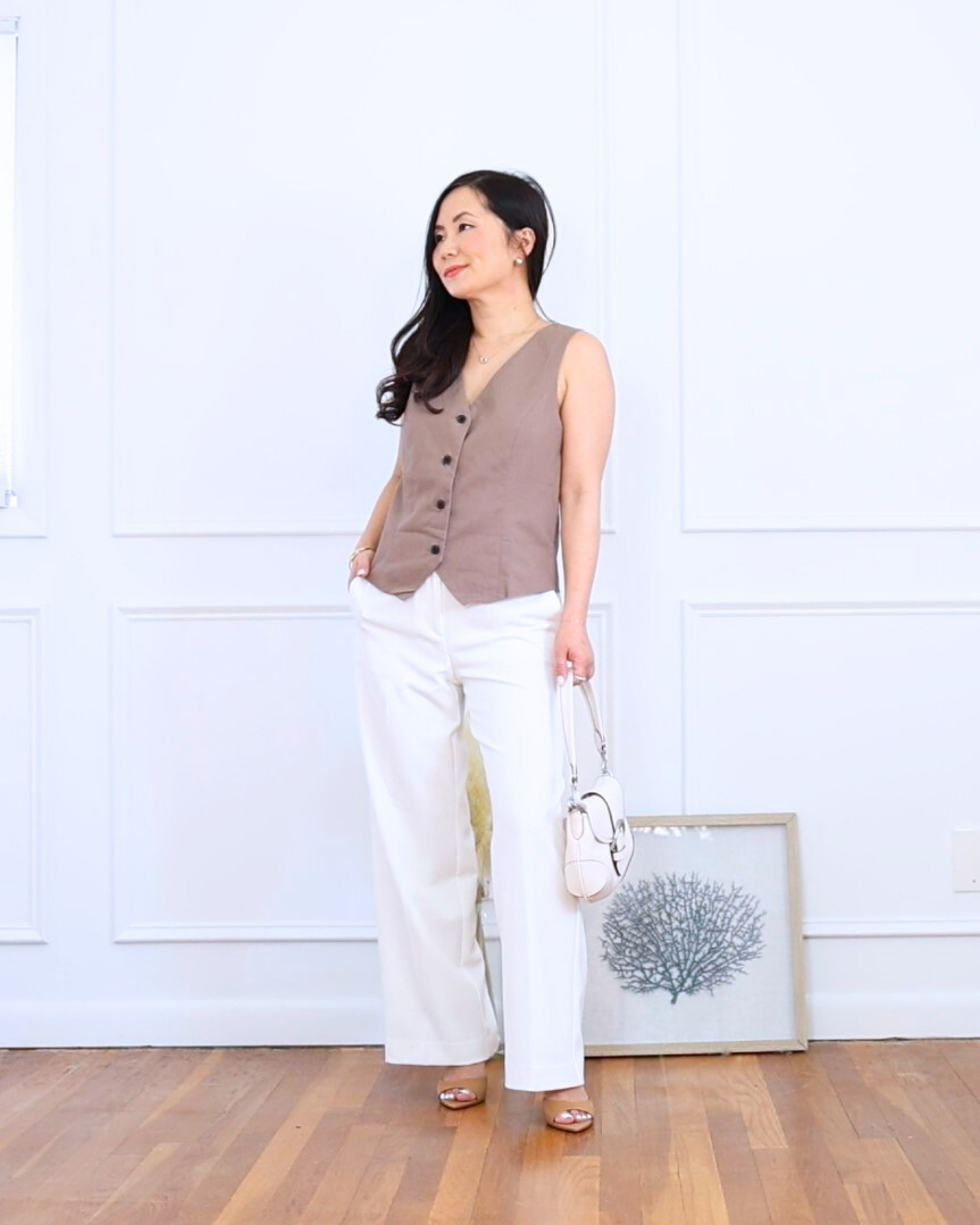 Loved this combo for a polished but easy look—this vest with white wide leg pants and open-toe mules felt chic without trying too hard. Perfect for my fellow petites! I’m 5’2, wearing size S.

#LTKOver40 #LTKStyleTip #LTKPetite