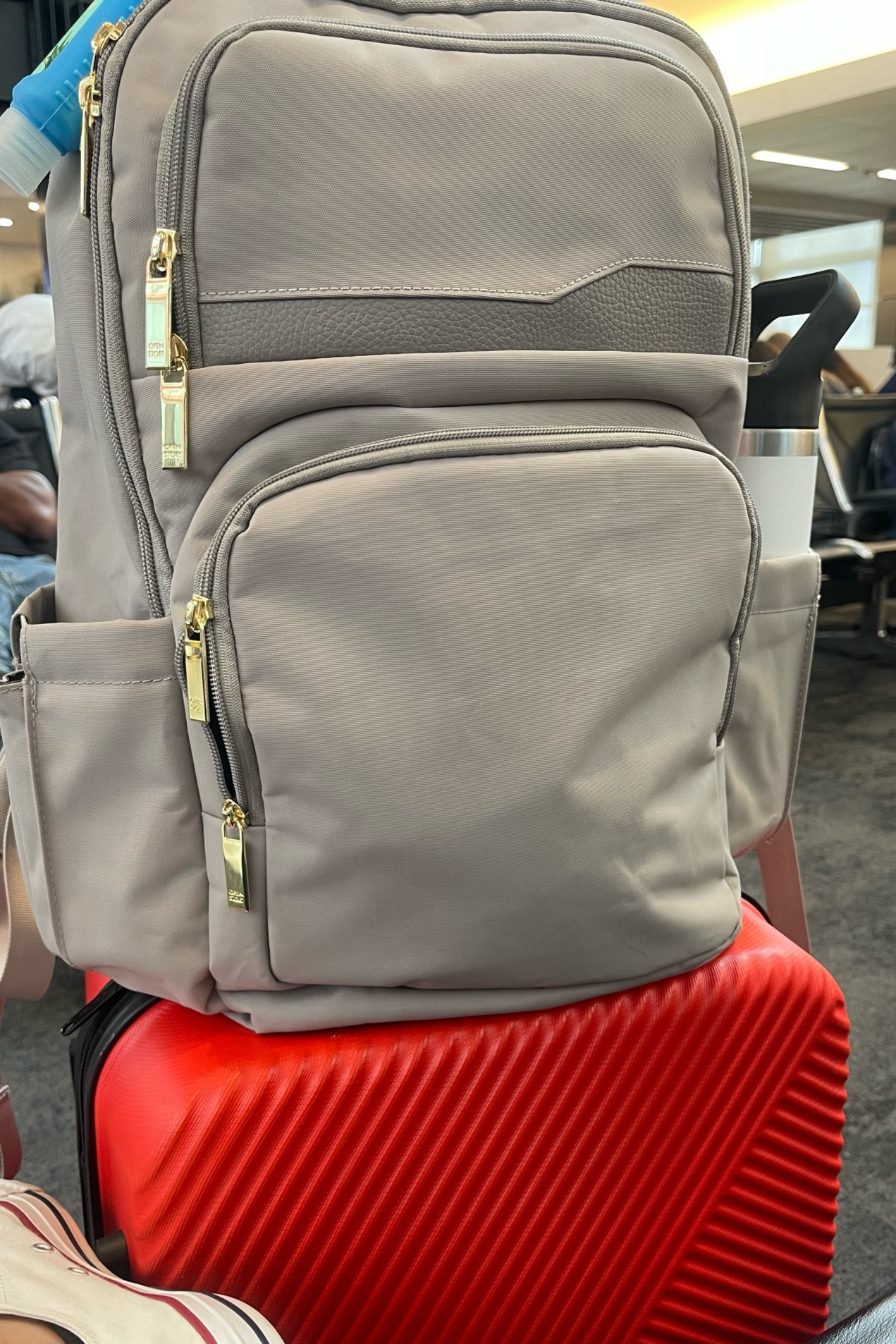 The best travel backpack. I love the color of this bright red suitcase 