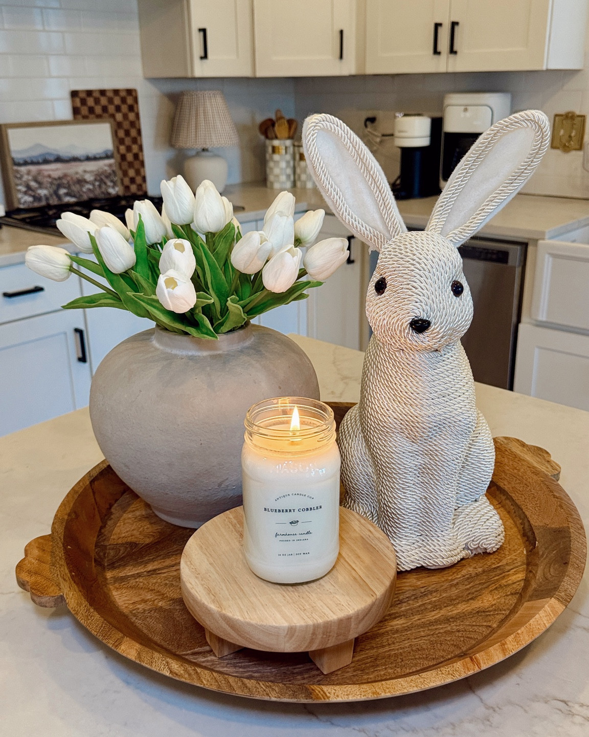 Easter Kitchen Decor Idea! These realistic artificial tulips are my go-to every spring! Just pop them in a vase or mason jars for an effortless spring centerpiece. I added a candle and bunny for the perfect Easter kitchen island styling. 

#LTKSeasonal #LTKFindsUnder50 #LTKHome
