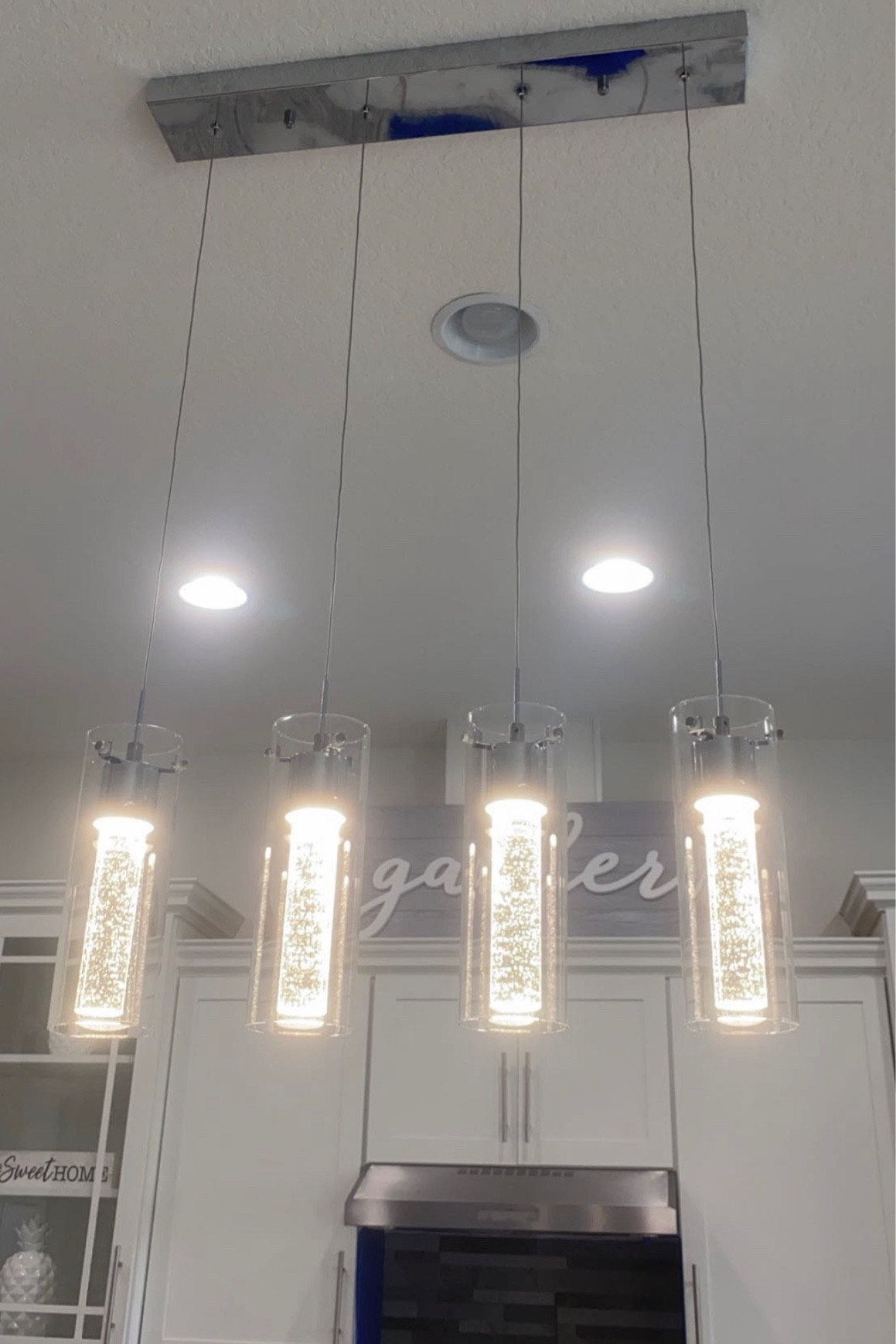 Gorgeous 4-light pendant fixture. LED kitchen lighting with premium bubble glass and chromed finish. Definitely adds elegance to any kitchen. #LED #kitchen #pendants #bubble #glass #elegance #stunning #glam #home #decor #LTKdecor #LTKkitchen #LTKstyle

#LTKunder100 #LTKunder50 #LTKhome