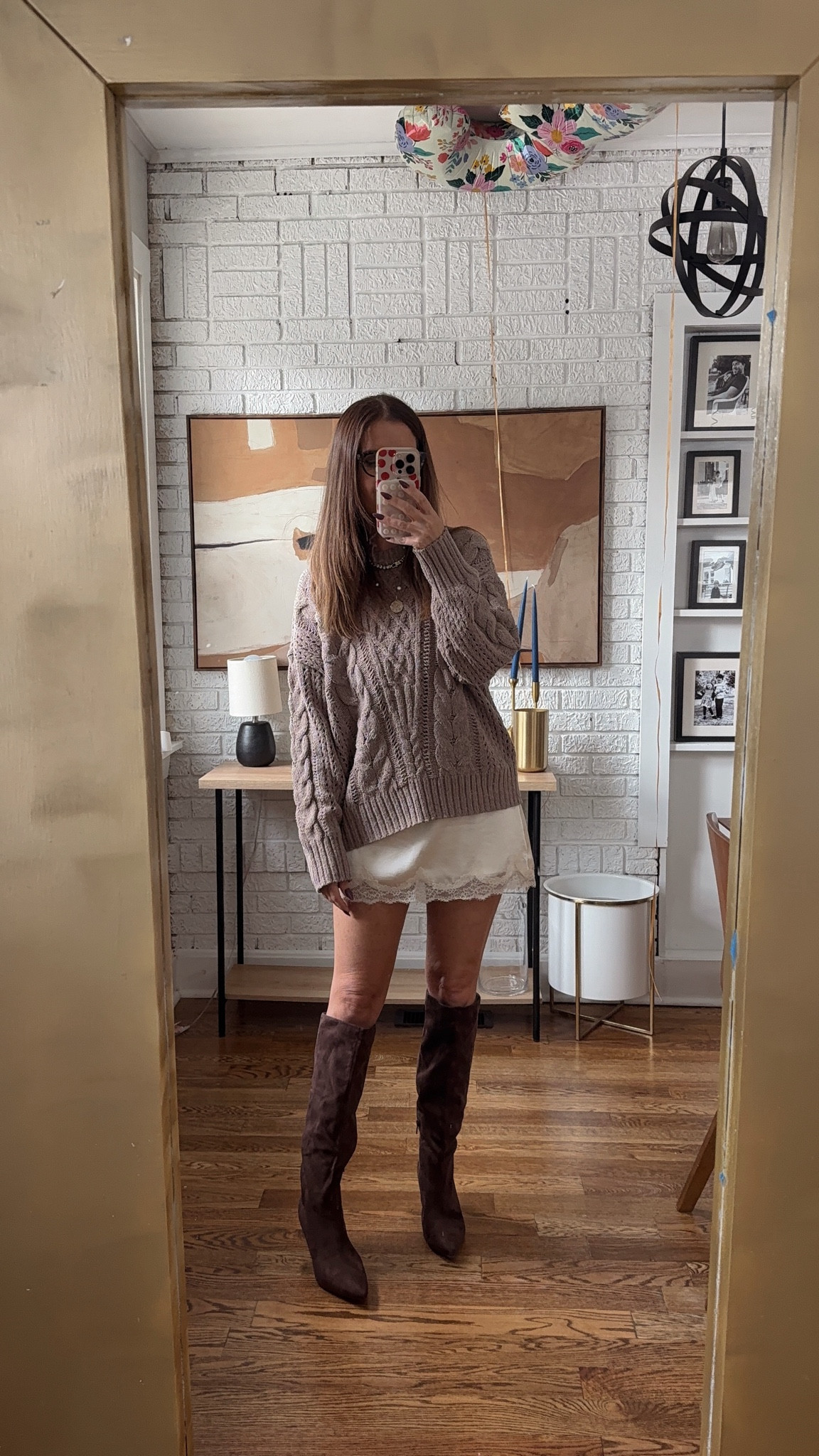 Lace silk skirt with oversize cap mate sweater. Skirt runs a little large. I’m wearing a small. I could definitely wear an extra small.  I sized up to a medium in the sweater for a more oversized look.  Boots are very comfortable and tts 

#LTKFallSale #LTKSeasonal #LTKOver40