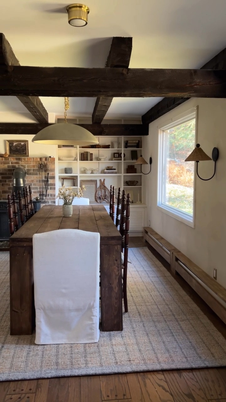 Cabin dining room refresh with @lightopia _ & @rugs_direct #lightopiapartner 

We gave our dining room at the cabin a much needed refresh by replacing the light fixtures, adding sconces, replacing the furniture and rug, lime washing the walls, and covering the old baseboards with covers. 

Simply updating light fixtures and rugs makes such an impactful difference in a space! 

#LTKHome