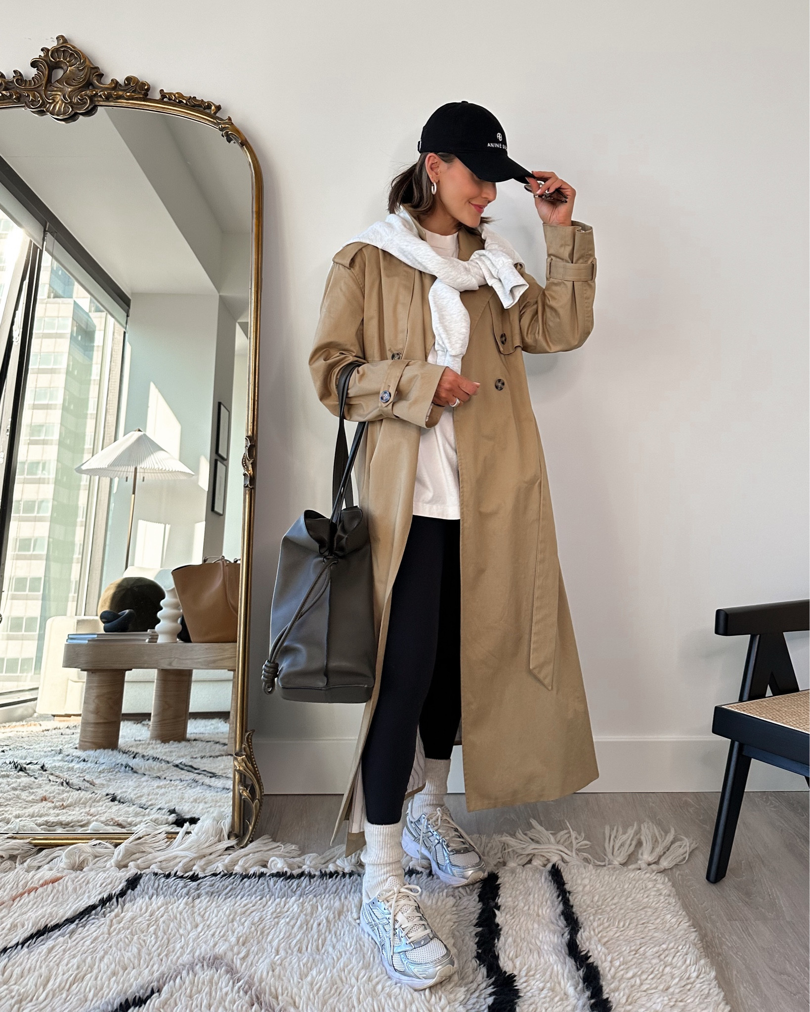 Sporty outfit wearing a trench coat
Oversized T-shirt XS 
Lululemon leggings size 4
XL tote great for work or travels 

#LTKstyletip #LTKfitness #LTKfindsunder100