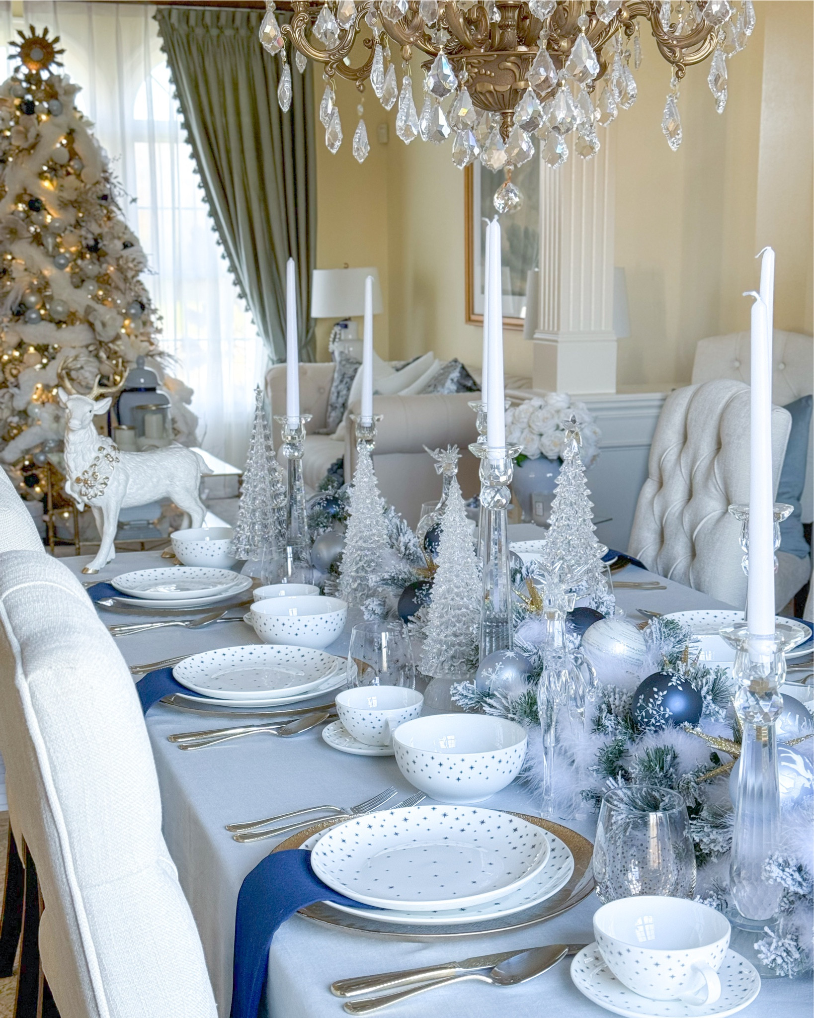 Shop my Starry Sapphire Night Christmas tablescape!

Winter tablescape, Christmas table, New Years tablescape, blue and white decor, blue Christmas, reindeer figurine, crystal trees, crystal candleholders, blue ornaments, Mikasa, acrylic reindeerr

#LTKHome #LTKHoliday #LTKSeasonal