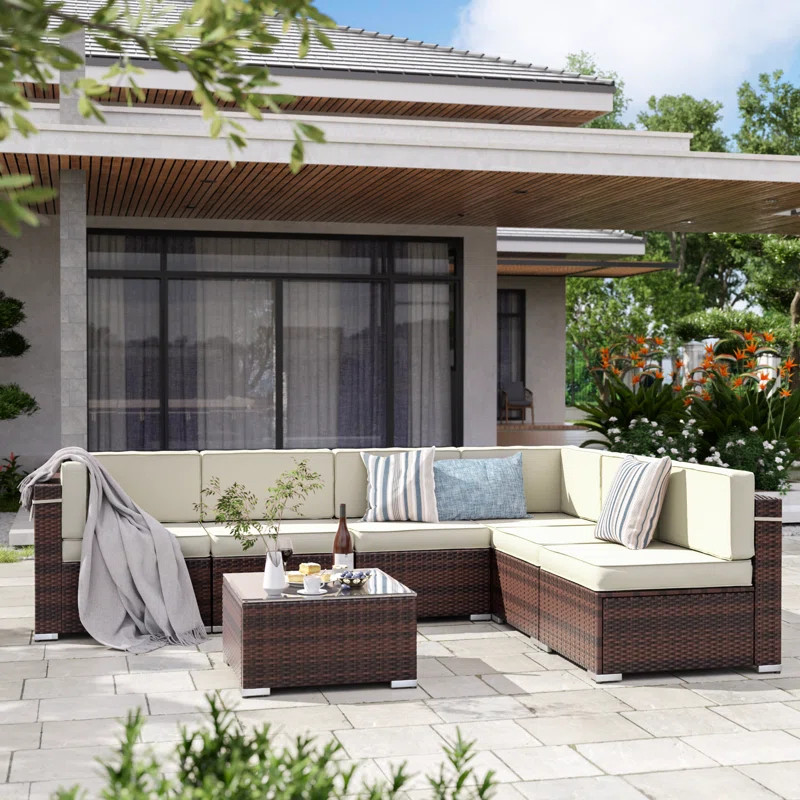 7 Piece Rattan Sectional Seating Group with Cushions | Wayfair North America