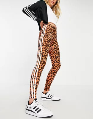 adidas Originals x Rich Mnisi all over leopard print legging in orange | ASOS (Global)