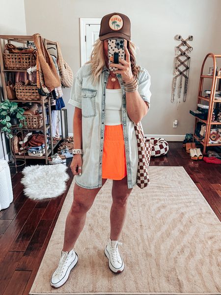 This skort is the cutest and I love it with my new fave tank! Both of these come in more colors and I’m wearing a medium in them. Also is perfect layered with this denim shirt! Wearing a medium in it too!🧡🏝️🩵✨
✨Sparkl watch band save with code MANDIE
✨Necklace & charms bought at hobby lobby 

#LTKOver40 #LTKFindsUnder50 #LTKStyleTip