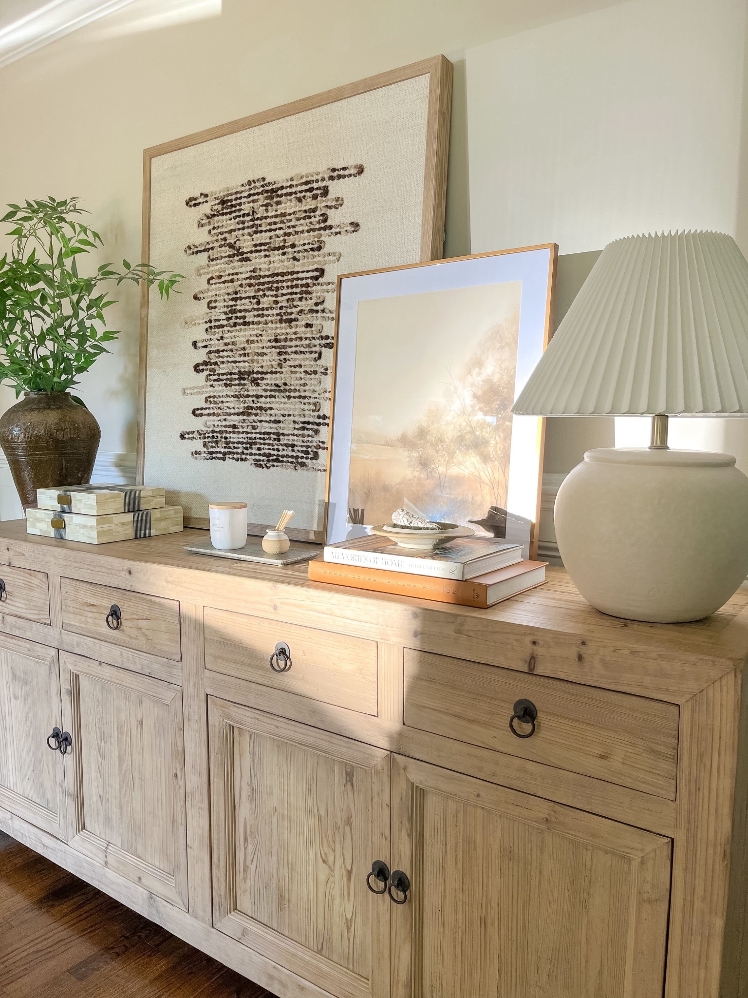 My new sideboard all styled for summer

Sideboard styling, Mijiu vessel, greenery, bone boxes, candle, sage, layered art 


#LTKSeasonal #LTKU #LTKHome