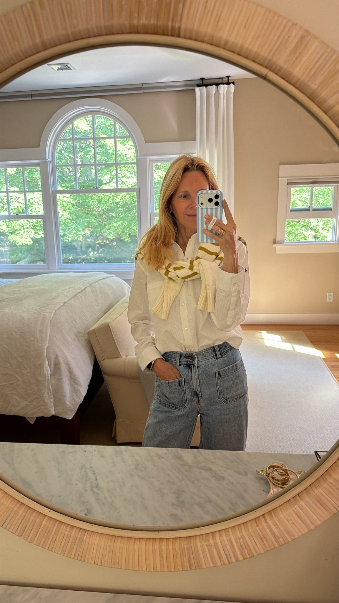 Jeans and a white button down.

#LTKootd #LTKgrwm #LTKdayinmylife