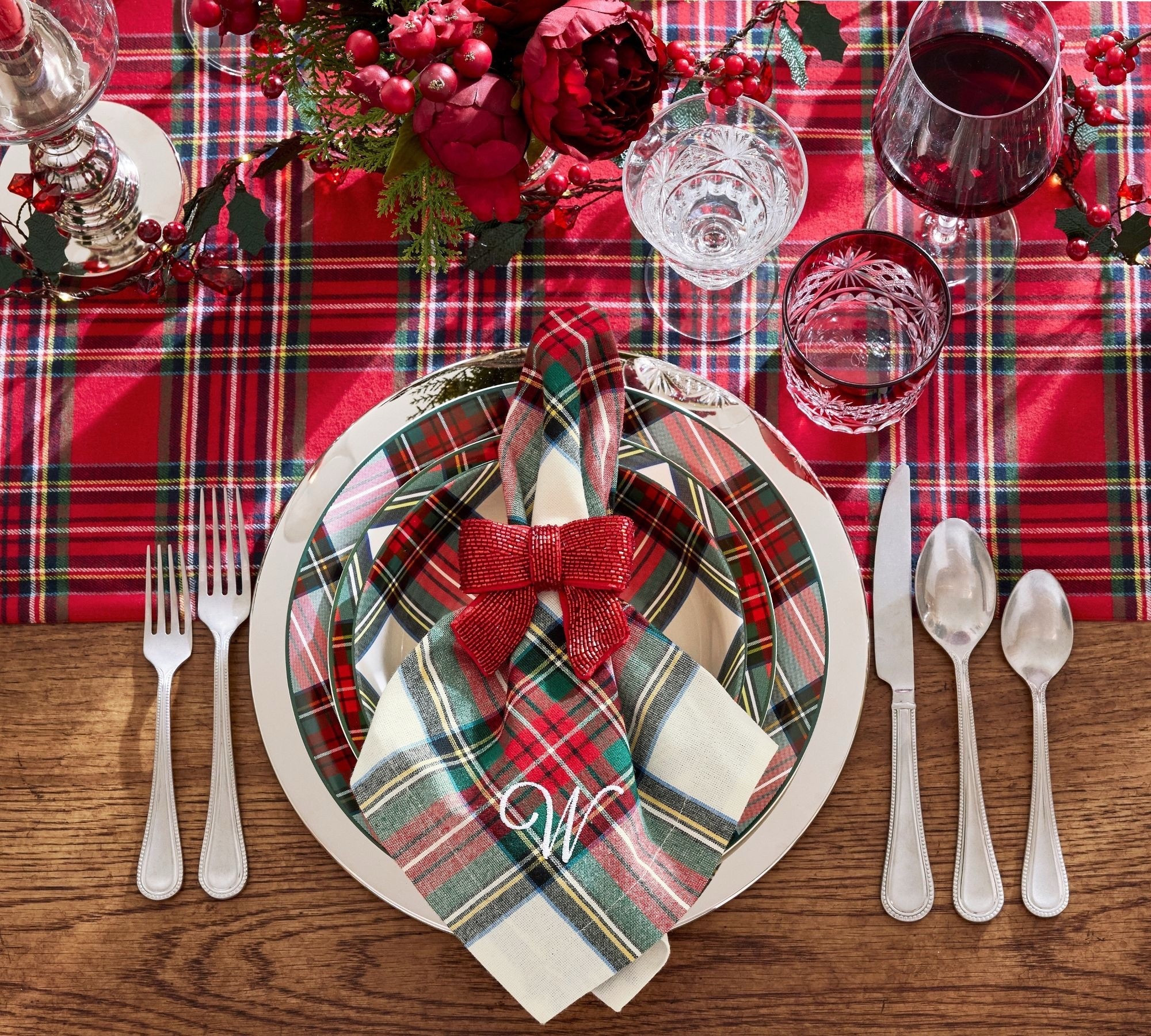 These Pottery Barn Stewart Plaid Cotton Napkins are so timeless. I love this table setting! #Christmas #tablescape #Christmastable #tablesetting #Christmasdinner #Christmasplaid #ralphlaurenchristmas 

#LTKHoliday #LTKSeasonal #LTKHome