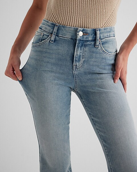 Mid Rise Light Wash Raw Hem FlexX '70s Flare Jeans | Express