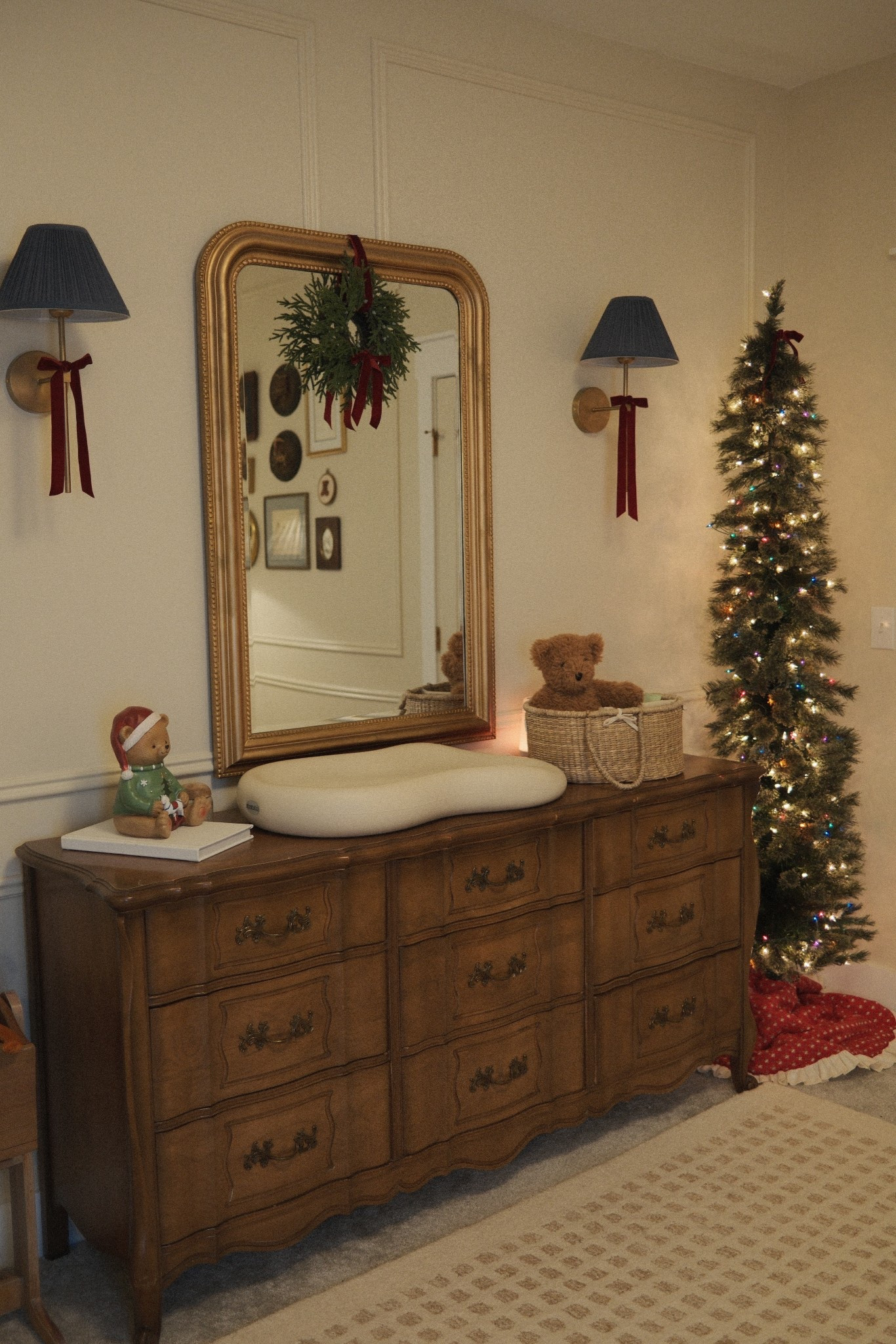 Baby boy nursery decorated for Christmas. 🎄 the bear is from Homegoods, the garland from the video is Homegoods, and the mini wreath is hobby lobby. ☺️ 

#LTKHoliday #LTKBaby #LTKHome