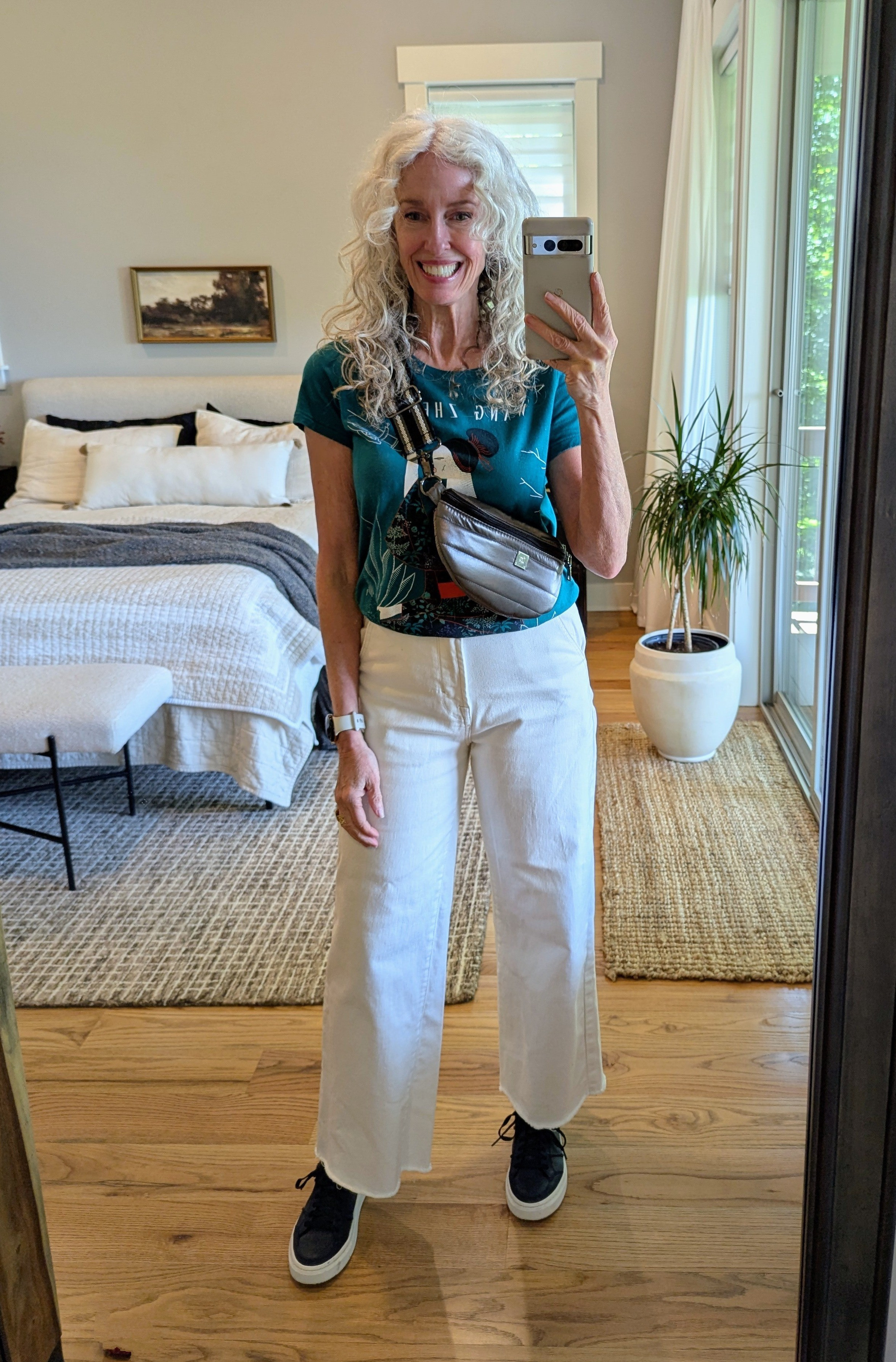 White jeans, graphic tee, sneakers, and a metallic crossbody, easy over-60 casual style #over60style #graphicteeMy tee is last year but found some great graphic tee options!

#LTKFindsUnder50 #LTKFindsUnder100 #LTKSummerEdit