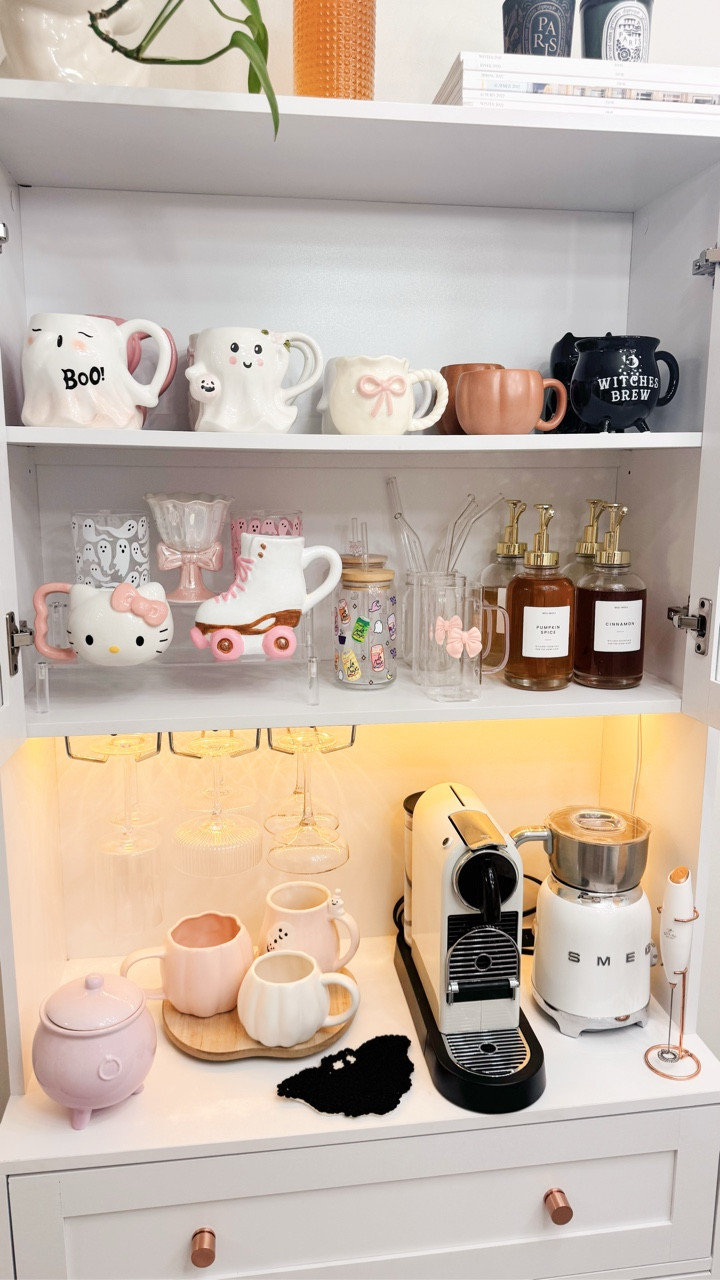 my coffee corner is ready for cozy season 🍂☕✨ i updated my little kitchen coffee corner for fall and i’m obsessed with how pink + spooky cute it turned out 🎀👻 there’s just something about having a decorated space for your morning latte that makes fall feel extra magical. which mug was your favorite? 🎃🤍

comment shop to get a dm with a link to shop this post: 

🍂☕👻✨💕
 #falldecor #falldecorideas #fallhomedecor #coffeecorner #cozydrinks  #fallhomemakeover #falldecorinspo #falldecoratingideas #girlyaesthetic #pinkaesthetic #pinterestaesthetic #pinterestinspired #pinterestinspo #cutedecor #girlyfall #cozyhomedecor #kitchendecor

#LTKHome #LTKFallSale #LTKHalloween