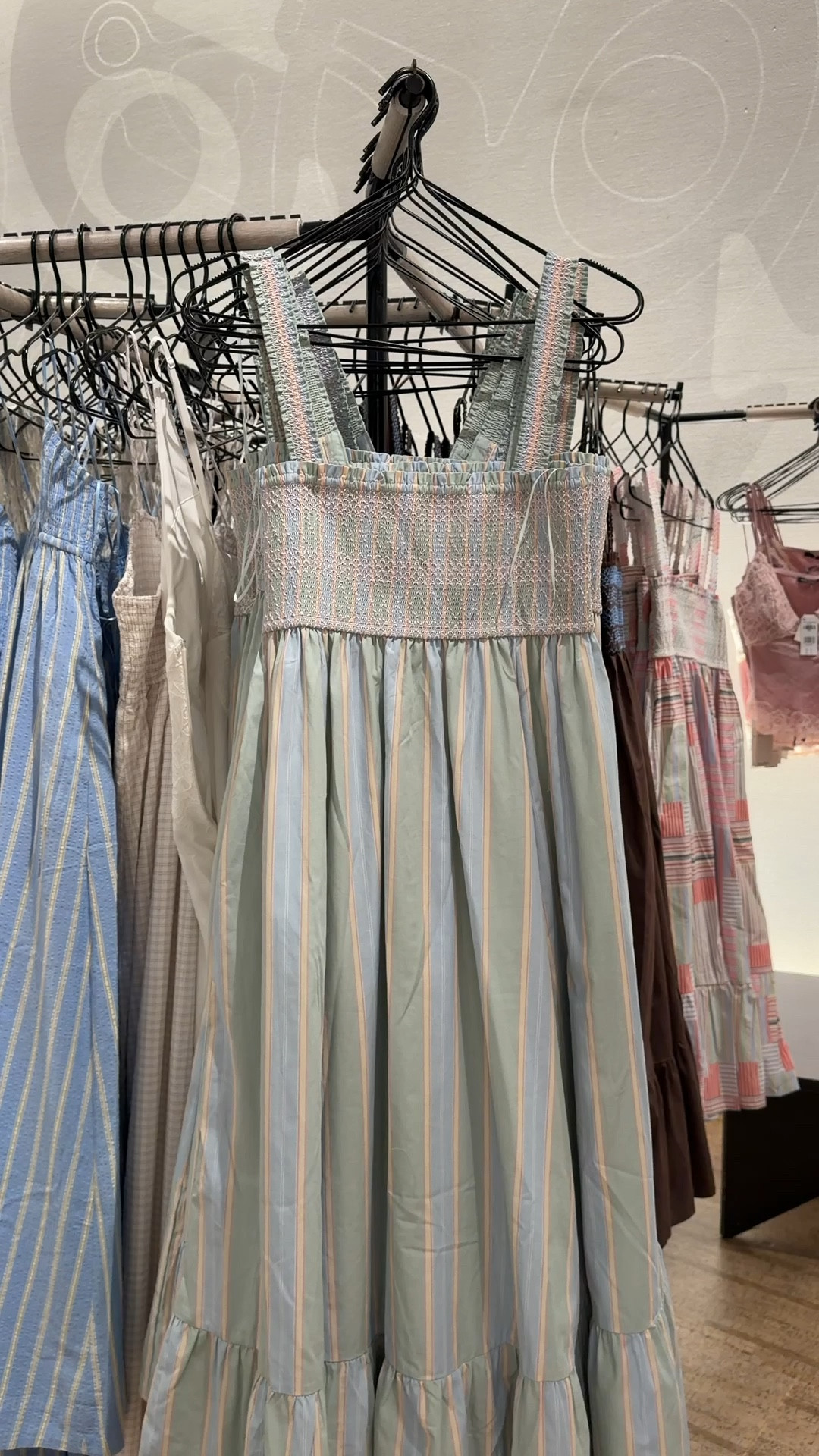 Such a cute spring-to-summer dress! 🩵 The A&F Sydney Smocked Convertible Midi Dress from Abercrombie & Fitch is shown here in the light sage stripe print with soft pastel tones—so fresh and pretty for the season. 🌸 The smocked bodice and flowy skirt create a flattering shape, and it even has side pockets. I love that it’s convertible—wear it as a dress or style it as a skirt with your favorite top. Comes in multiple prints and colors. Linked it here! 🫶🏻 #Abercrombie #SpringDress #SummerStyle 

#LTKootd #LTKPetite #LTKSeasonal