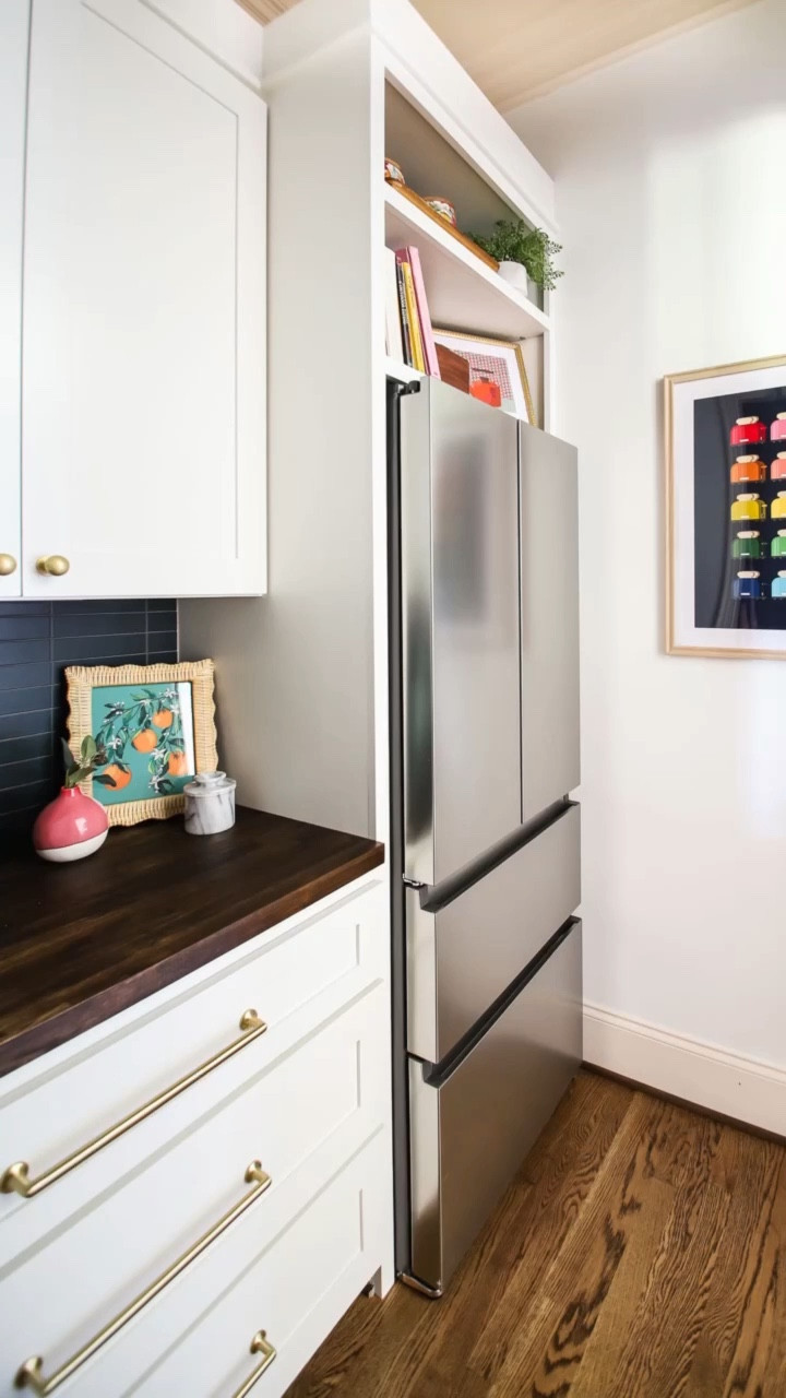 We couldn’t be happier with our latest labor of love and DIY project… the Butler’s pantry. Absolutely no regrets about ripping out the old, awkward built-in desk that we never used!!! Soon I’ll be working on getting it organized now that we have a better idea of how we use this space every day. 

Colorful kitchen, colorful kitchen art, orange blossom art, brass drawer poles, brass knobs, wood countertop, Butler’s pantry, Spring decor, spring home decor

#LTKSeasonal #LTKhome #LTKFind
