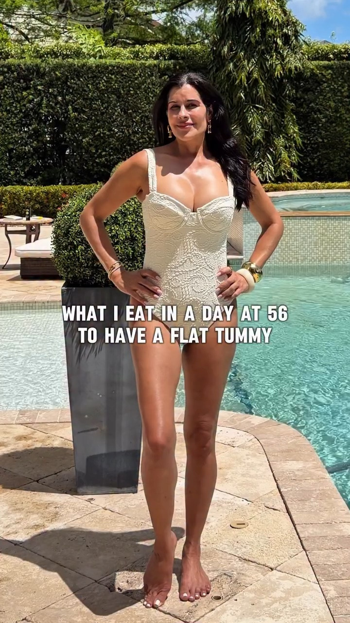 What I eat in a day at 56 to have a flat tummy. I eat carbs every day and my stomach is flatter now than it was in my 40s. Here is exactly what I do.
One tablespoon of apple cider vinegar in 8 oz of water before anything. Acetic acid slows glucose absorption so your body stores less fat.
Lemon water to hydrate after sleeping all night.
A small bowl of blueberries strawberries and walnuts with green juice. Fiber starts with my first meal and I never have coffee on an empty stomach because caffeine on an empty stomach spikes cortisol which leads to belly fat storage.
Electrolytes then coffee with oat milk. I dropped dairy and the bloating stopped. Dairy causes inflammation in the gut for a lot of women and they have no idea.
Protein shake with flax seeds. More fiber and it keeps you full longer because it slows digestion.
Walk my dog. Moving after you eat helps your muscles use glucose instead of letting your body store it as fat.
Lunch is my biggest meal. Salad with homemade dressing salmon white rice and black beans. Fiber on every plate. Then blueberry pie because something sweet is not negotiable.
After lunch I grab the laundry and walk down my hallway. That is my gym. Even ten minutes of movement after eating lowers your blood sugar before it spikes.
Water all day. Fiber needs water to move through your system. Without it fiber causes bloating instead of reducing it.
Dinner is gluten free. Tortilla chips with homemade dip chicken meatballs and green beans. Gluten causes inflammation and bloating for a lot of women over 40.
After dinner I walk again. Three meals three walks.
One more tablespoon of apple cider vinegar with water before bed. Studies show this helps stabilize blood sugar while you sleep.
Fiber at every meal. Movement after every meal. That is the whole secret.
Save this for later. 
#flattummy #whatieatinaday #womenover40