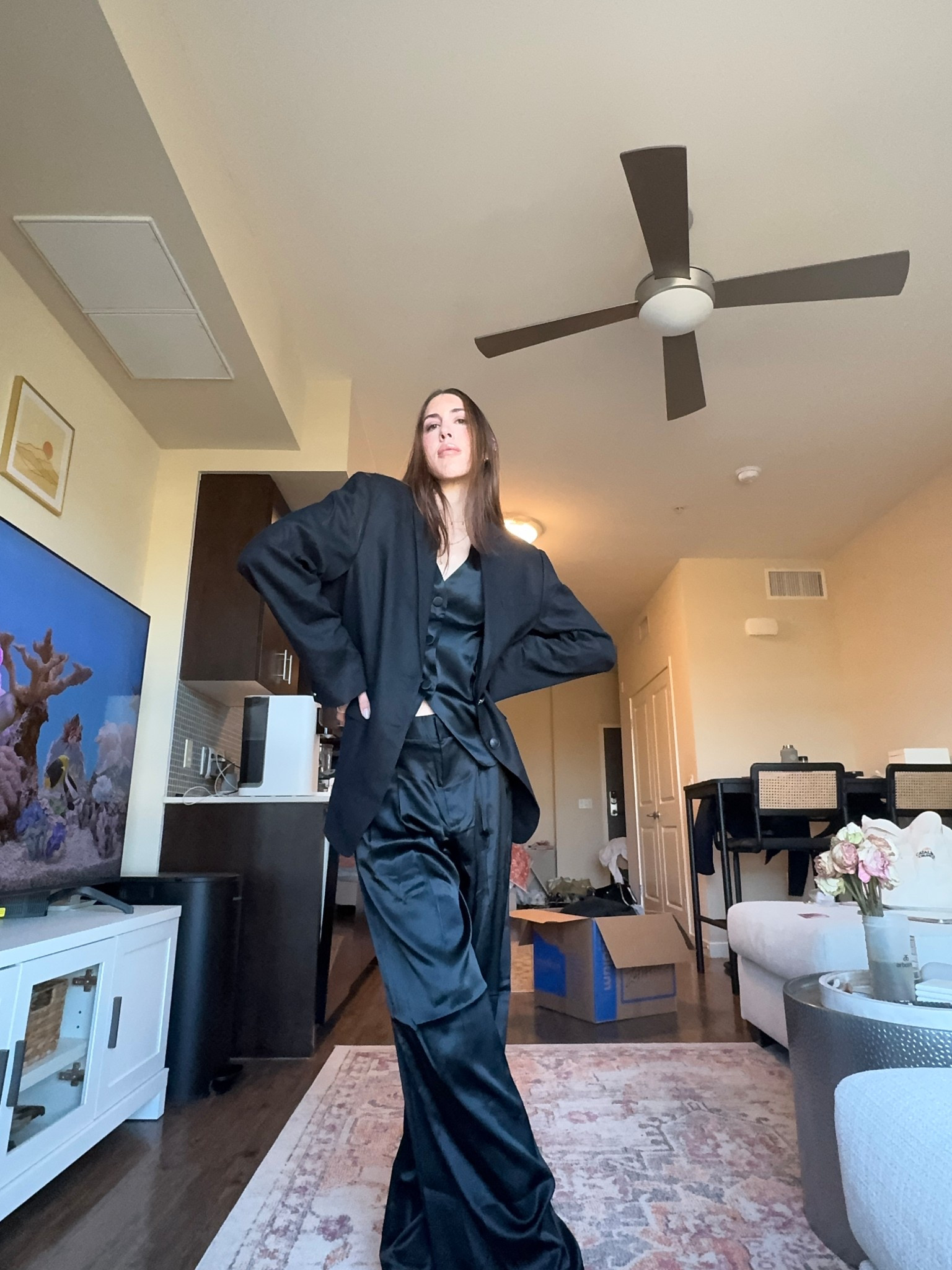 Fun’s big, size down. Size 0 in black silk pants and vest. Normally size 2-4 in women’s ! Handbag is vintage, juicy couture, but these are what I would also wear !