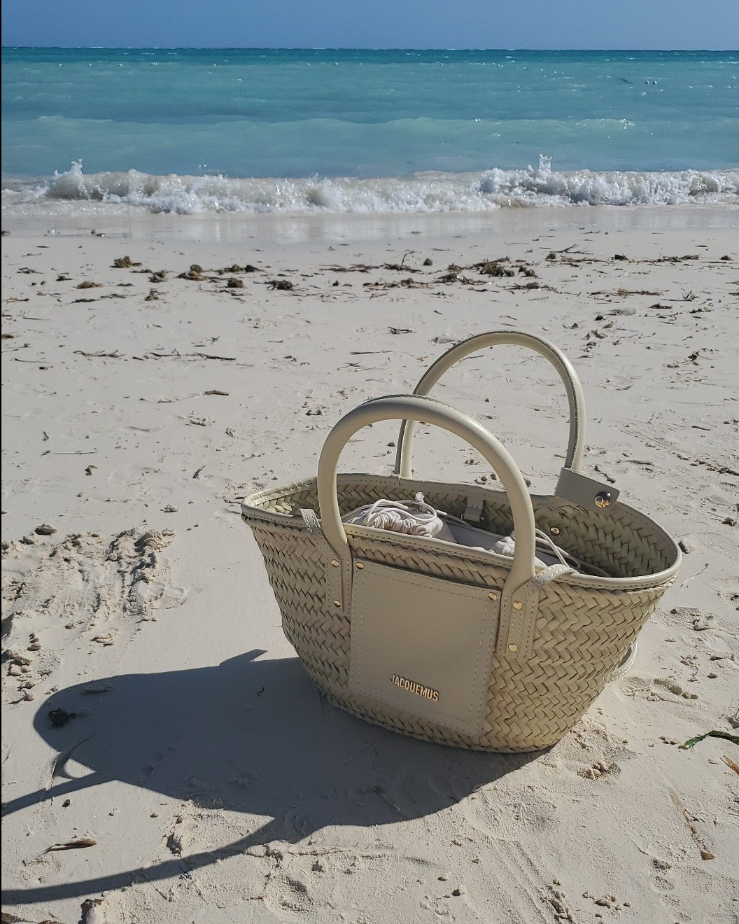 Jacquemus tote, beach, pool, woven bag, straw, crossbody, designer sale, deals.

#LTKstyletip #LTKitbag #LTKsalealert