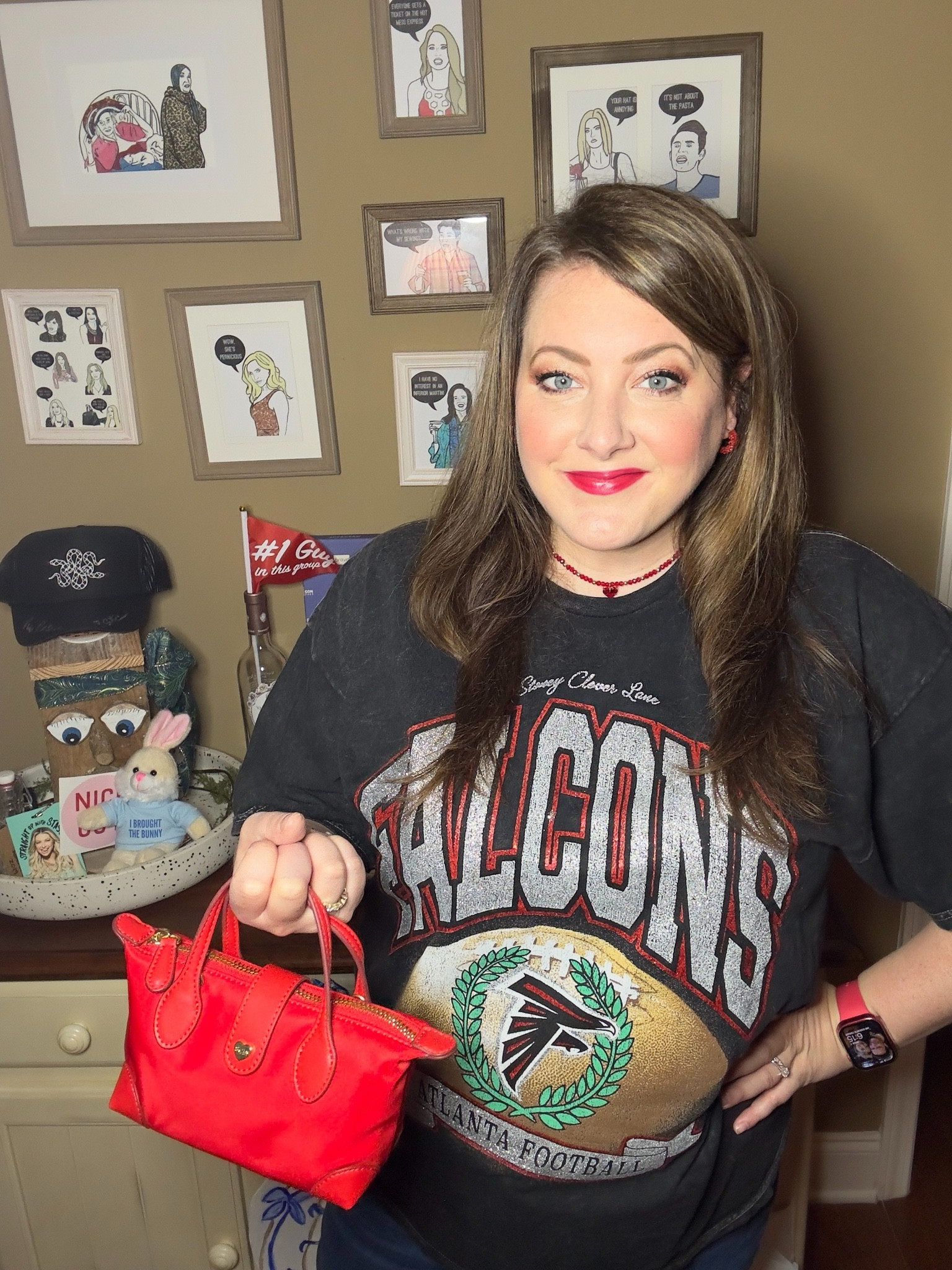 Go Falcons! It’s not 🏈 season without a little sparkle in my world ✨ this tee is such a fun accessory and this pouchette is regulation size for a game! 

#LTKItBag #LTKOver40 #LTKSeasonal