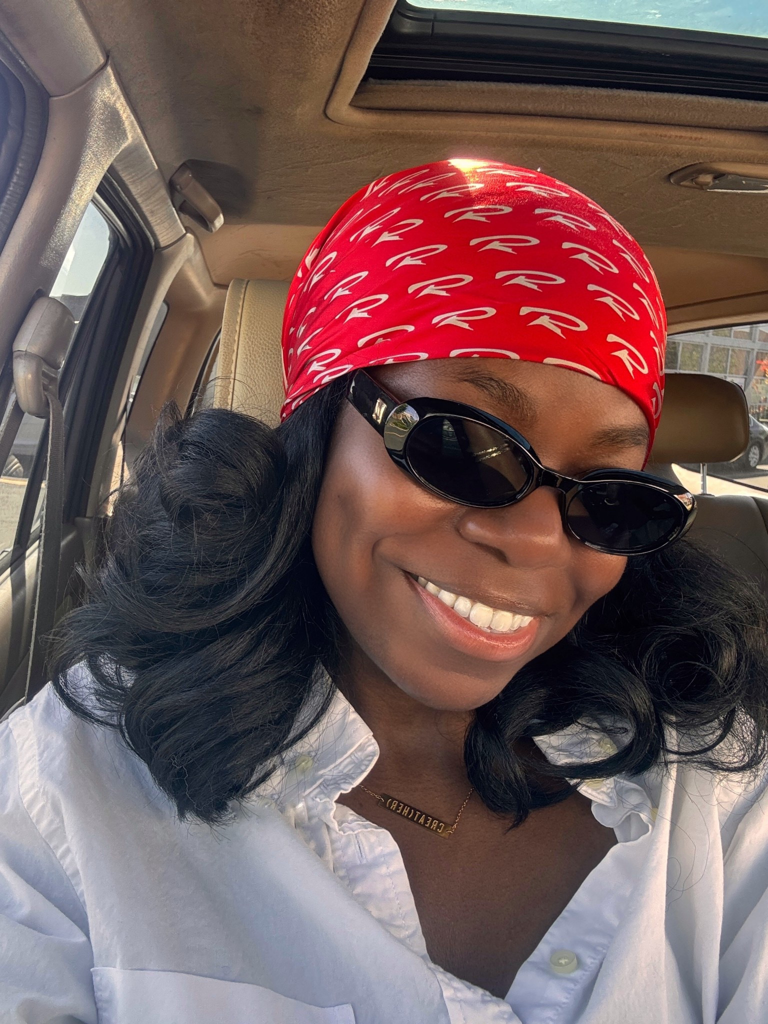 Red silk headscarf and black sunglasses

#LTKStyleTip #LTKFestival