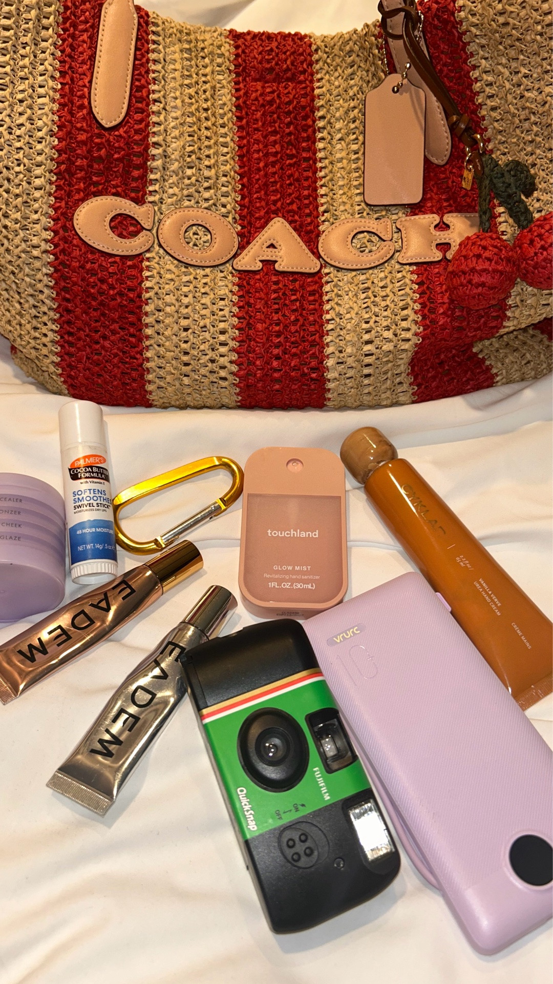 Current Staples in my Coach City Tote while I am out and about this summer hand lotion by Cyklar, portable charger sanitizer, Eadem lip balm, my SUBTL beauty Stak, and a sleeper traveler toll, a.k.a. the carabinder ￼

#LTKgrwm #LTKTravel #LTKOver40