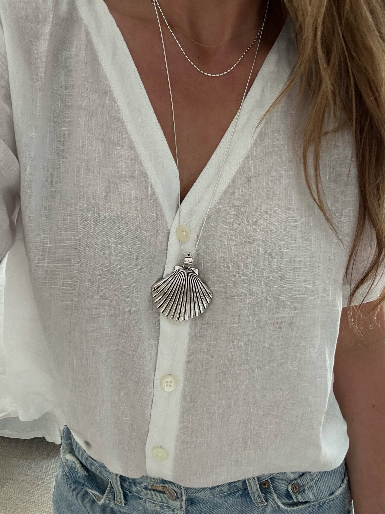 Silver shell pendant necklace for summer (amazing price). Also linked some other ones from same vendor.

Top is Garnet Hill (can’t link). 

#LTKSummerEdit #LTKFindsUnder50