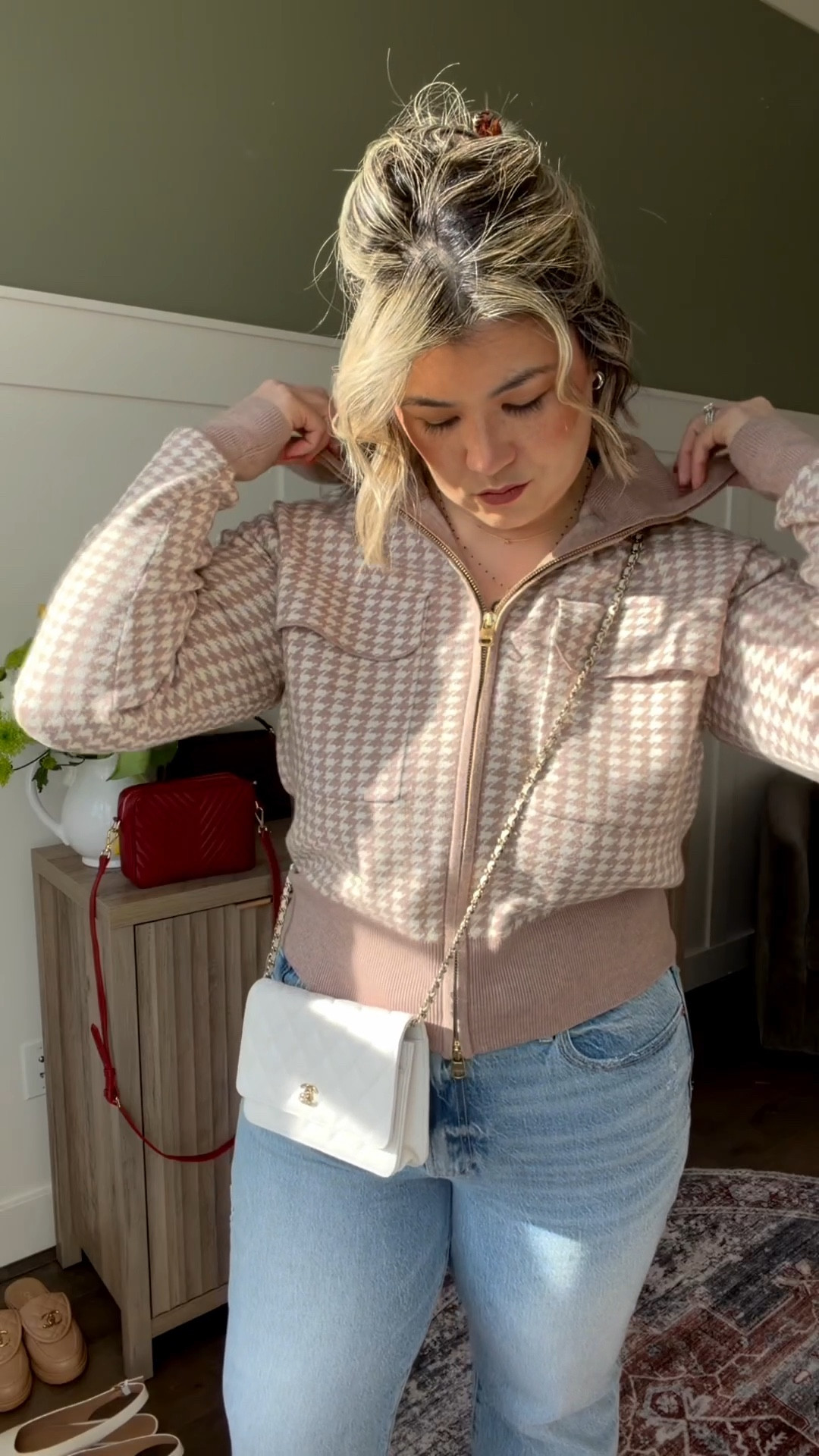 Saw this houndstooth zip sweater from a mile away and be blinded it to check it out. It’s made by @Varley so I knew the quality was going to be there. Then after trying it on, it was an immediate yes for me. I brought this home in a size medium, I feel like it runs slightly on the big side.

#LTKMidsize #LTKootd #LTKOver40