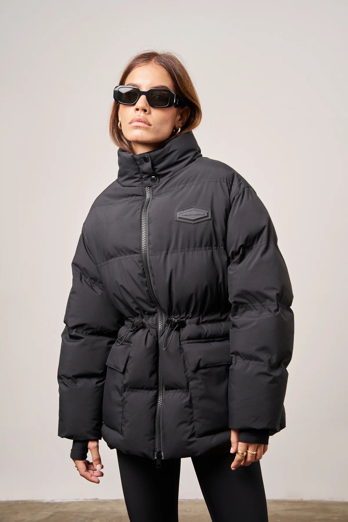 TIE WAIST PLEATED PUFFER COAT - BLACK | The Couture Club